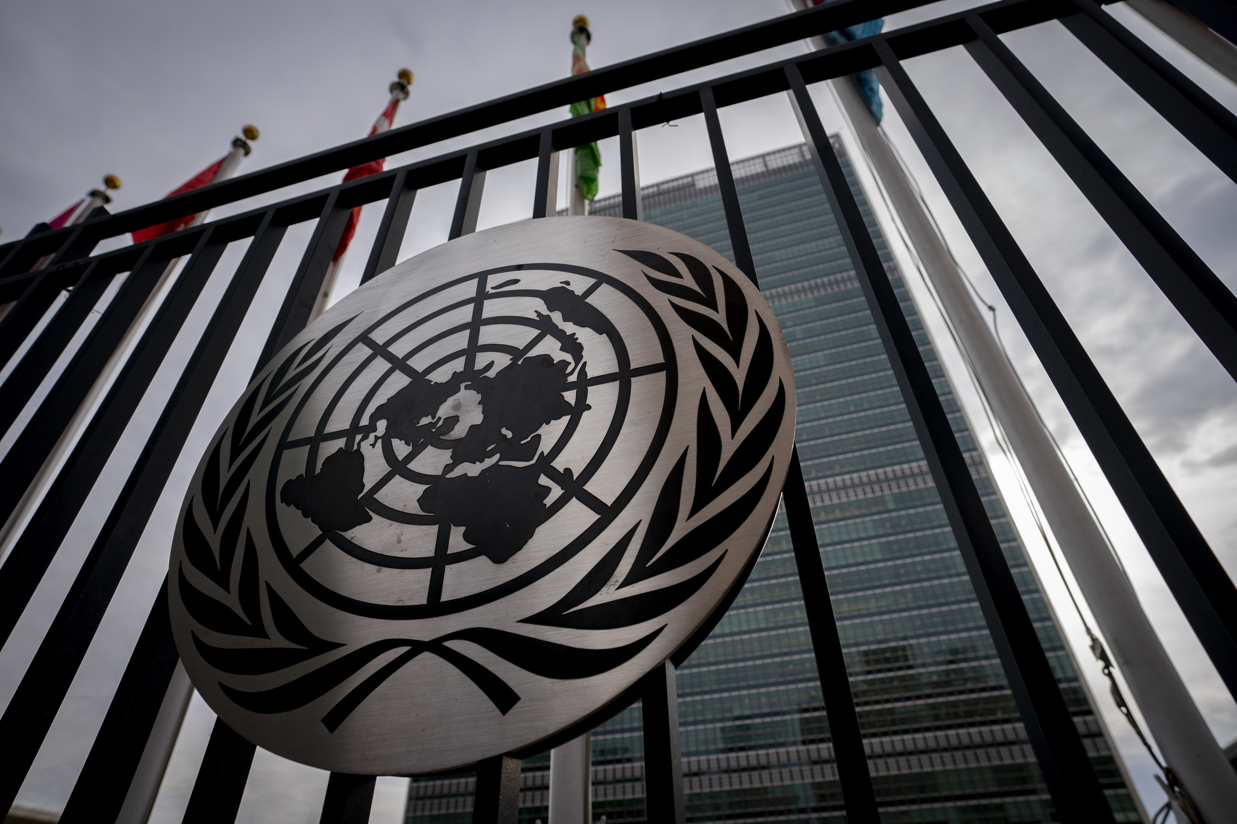 The symbol of the United Nations is displayed on the main gate outside UN headquarters in New York in February. Photo: AP