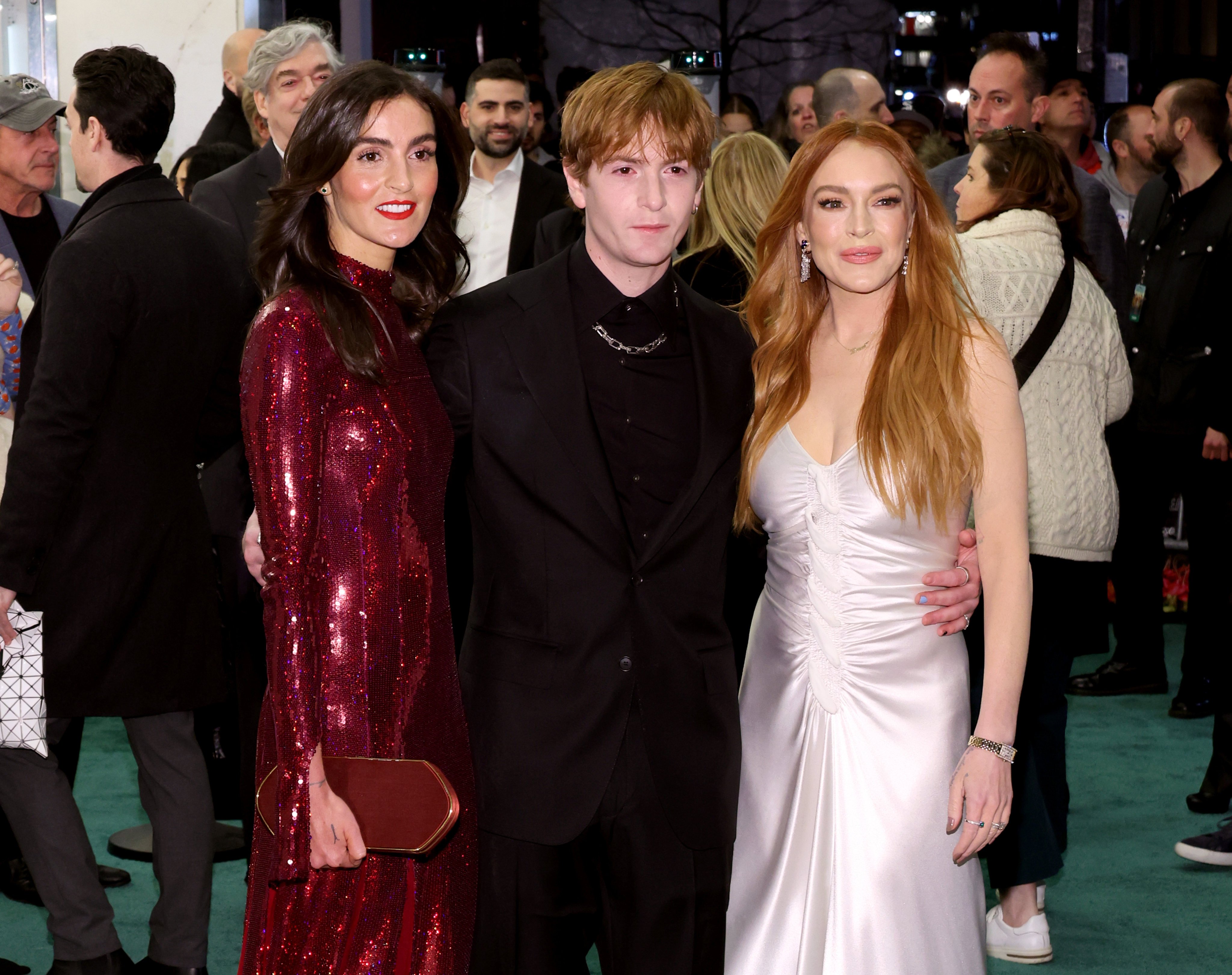 Lindsay Lohan with her siblings Aliana Lohan and Dakota Lohan at the premiere of Irish Wish. Photo: Getty Images