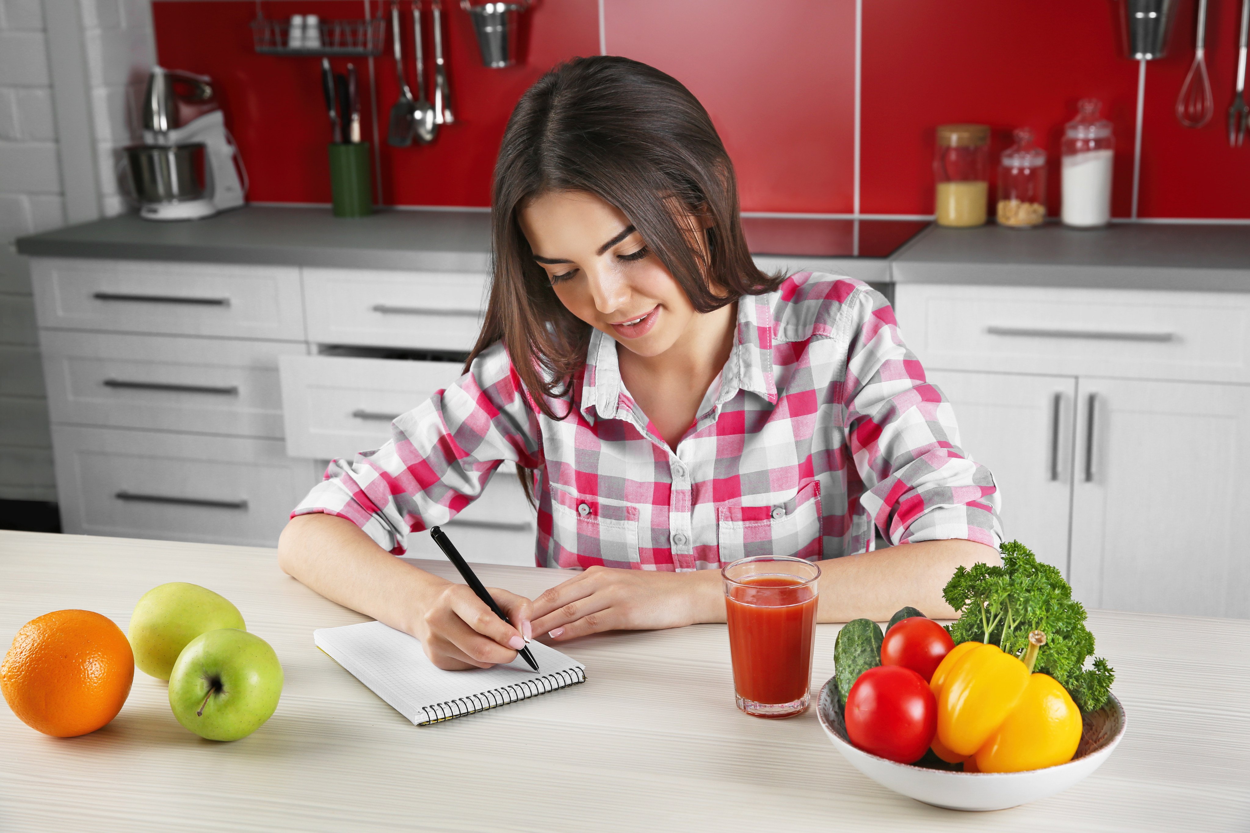 Keeping a journal to note when food cravings appear, their intensity and how you deal with them is one expert tip when it comes to fasting - whether you’re doing it for health reasons such as weight loss or for holy seasons. Photo: Shutterstock