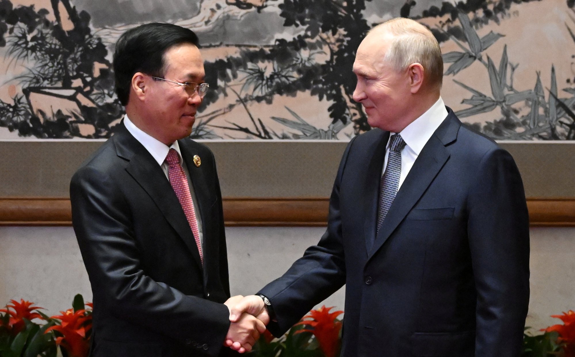 Vietnam’s then-President Vo Van Thuong shakes hands with Russian President Vladimir Putin during a meeting in Beijing in October last year. Photo: Sputnik/via Reuters