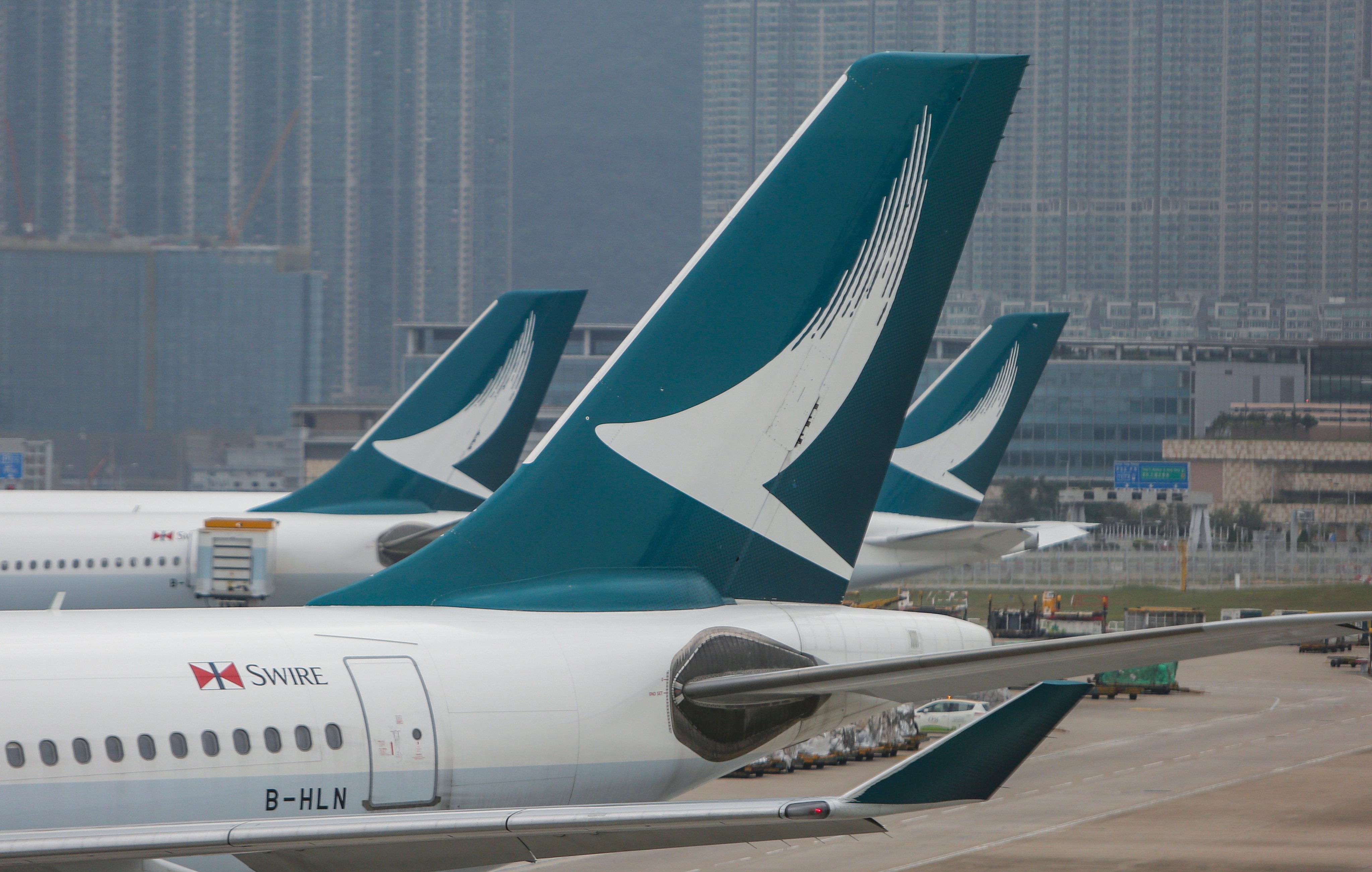 A Cathay Pacific flight parks at Hong Kong International Airport. Photo: Winson Wong