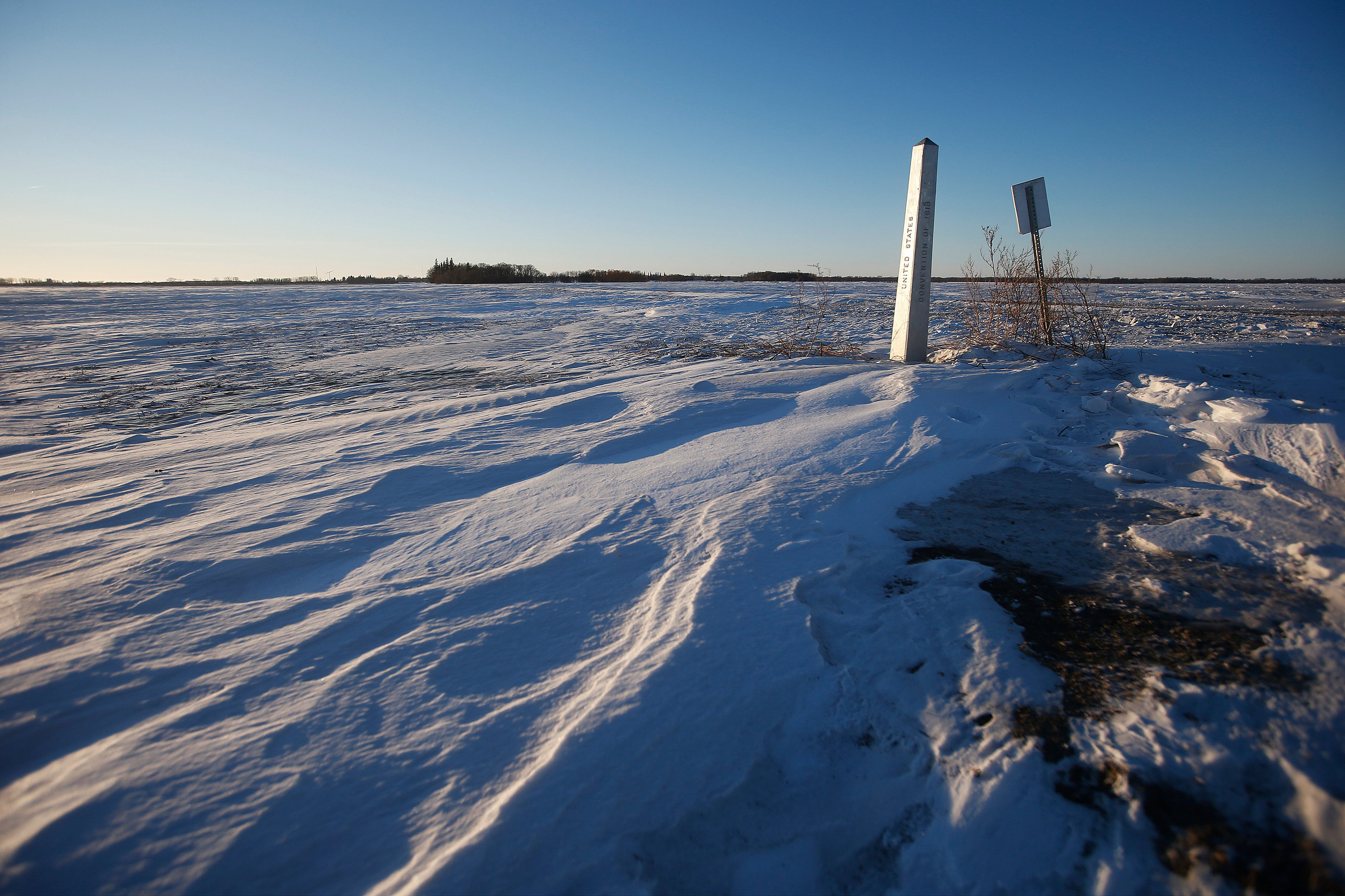 A border marker between the US and Canada at Emerson, Manitoba. Photo: The Canadian Press via AP
