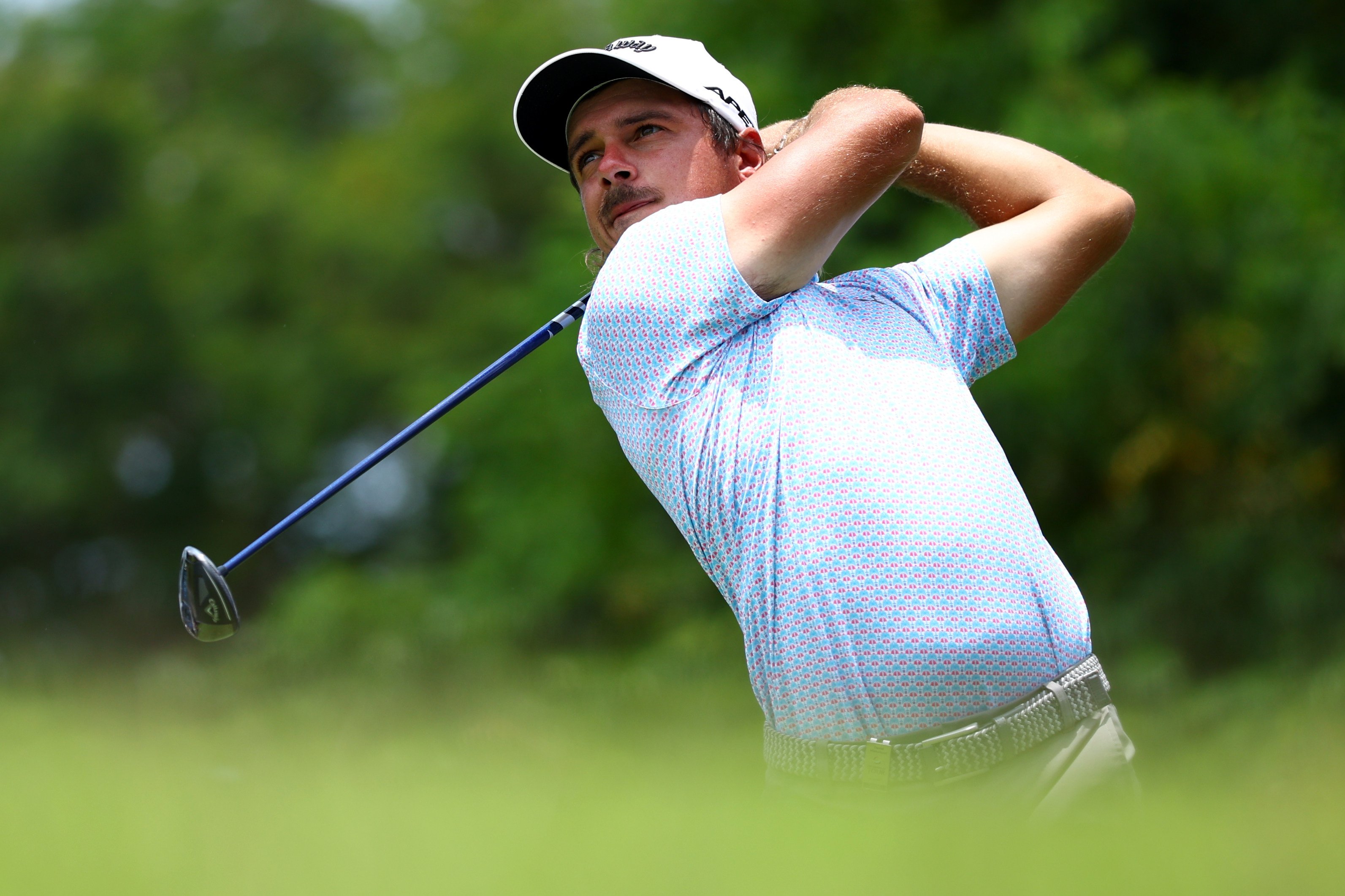 David Micheluzzi tees off on 15 during the third round of the Porsche Singapore Classic. Photo: Getty Images