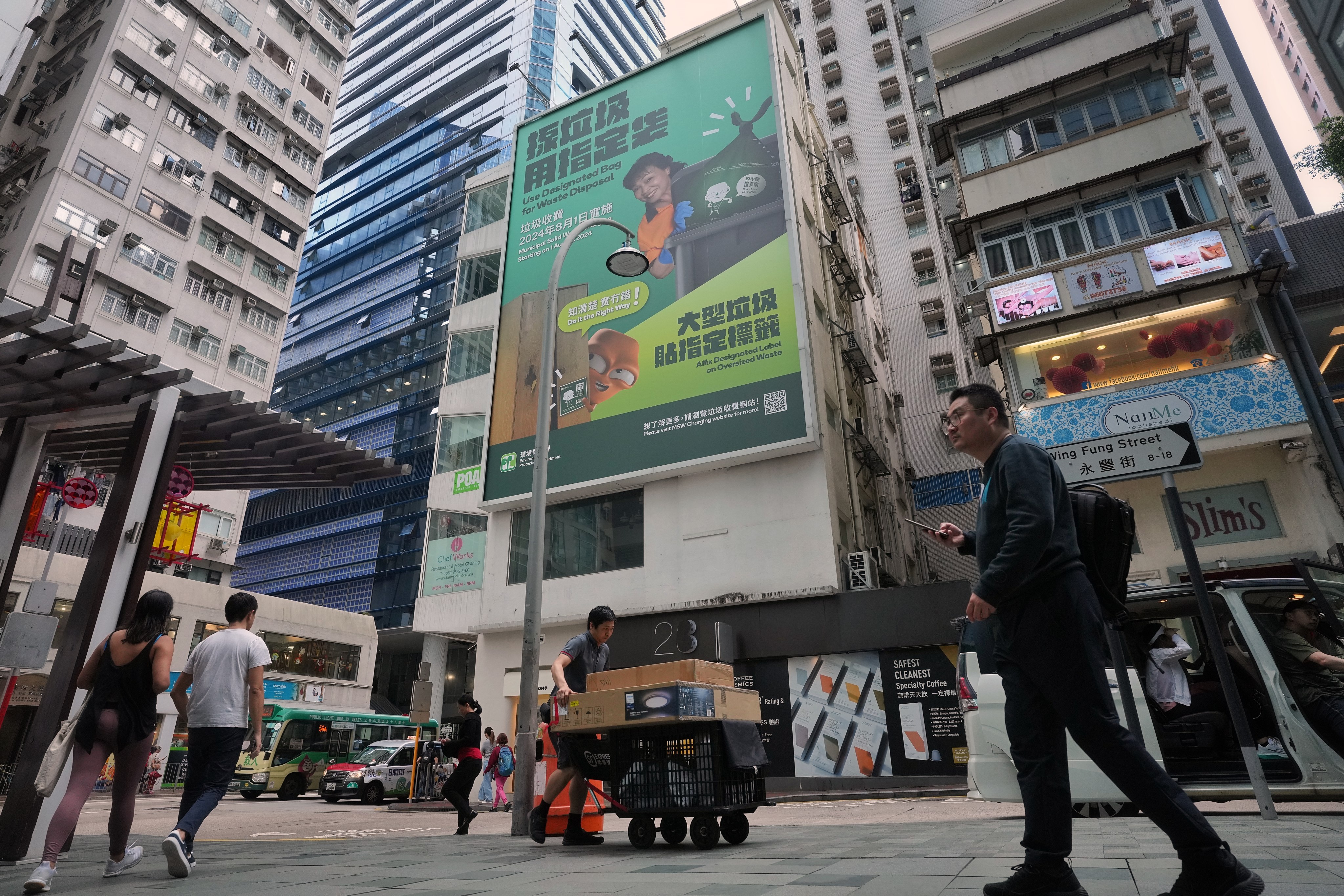 A billboard advertising the government’s waste charging scheme in Wan Chai. Photo: Elson Li