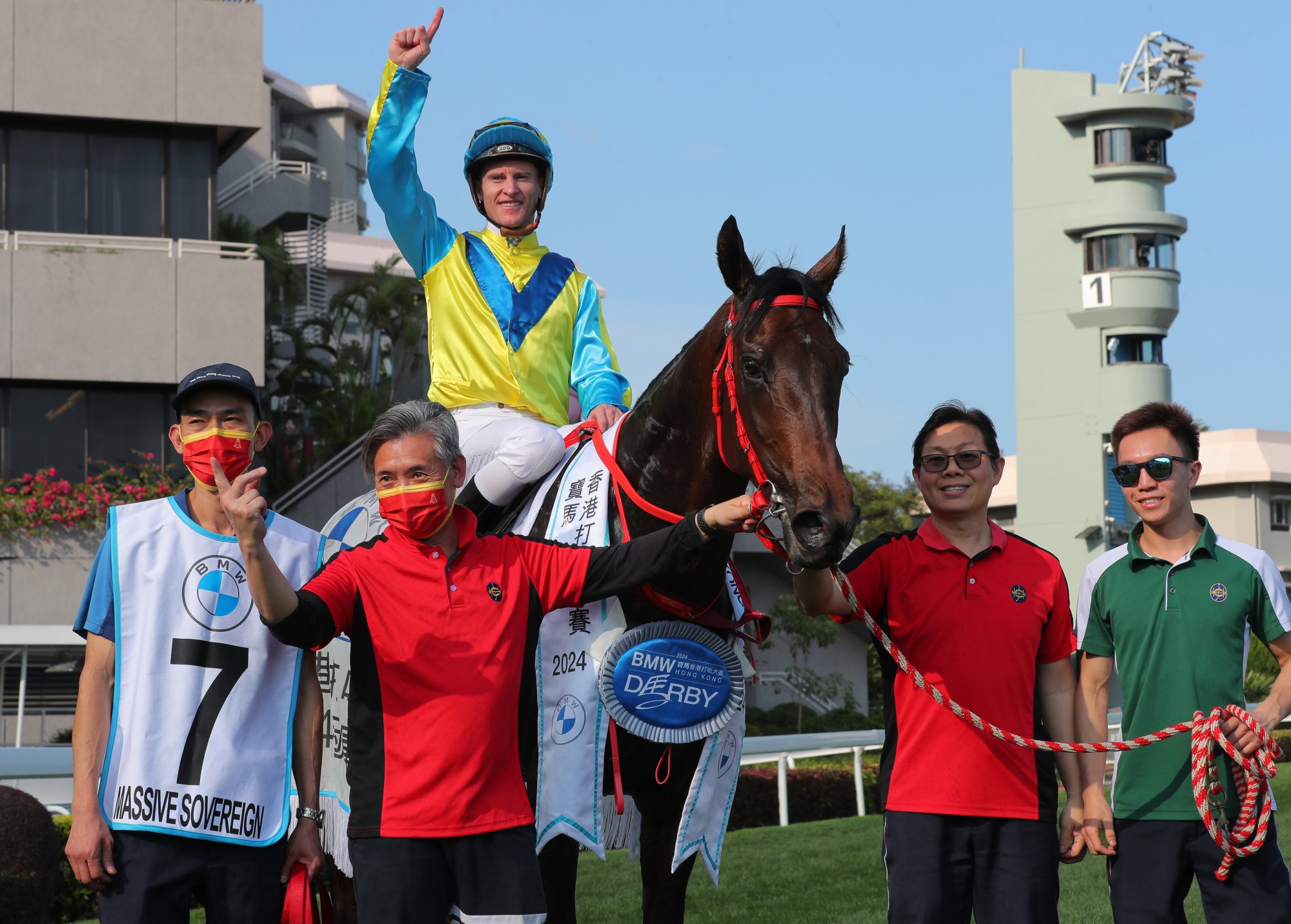 Zac Purton laps up his Hong Kong Derby win on Massive Sovereign.