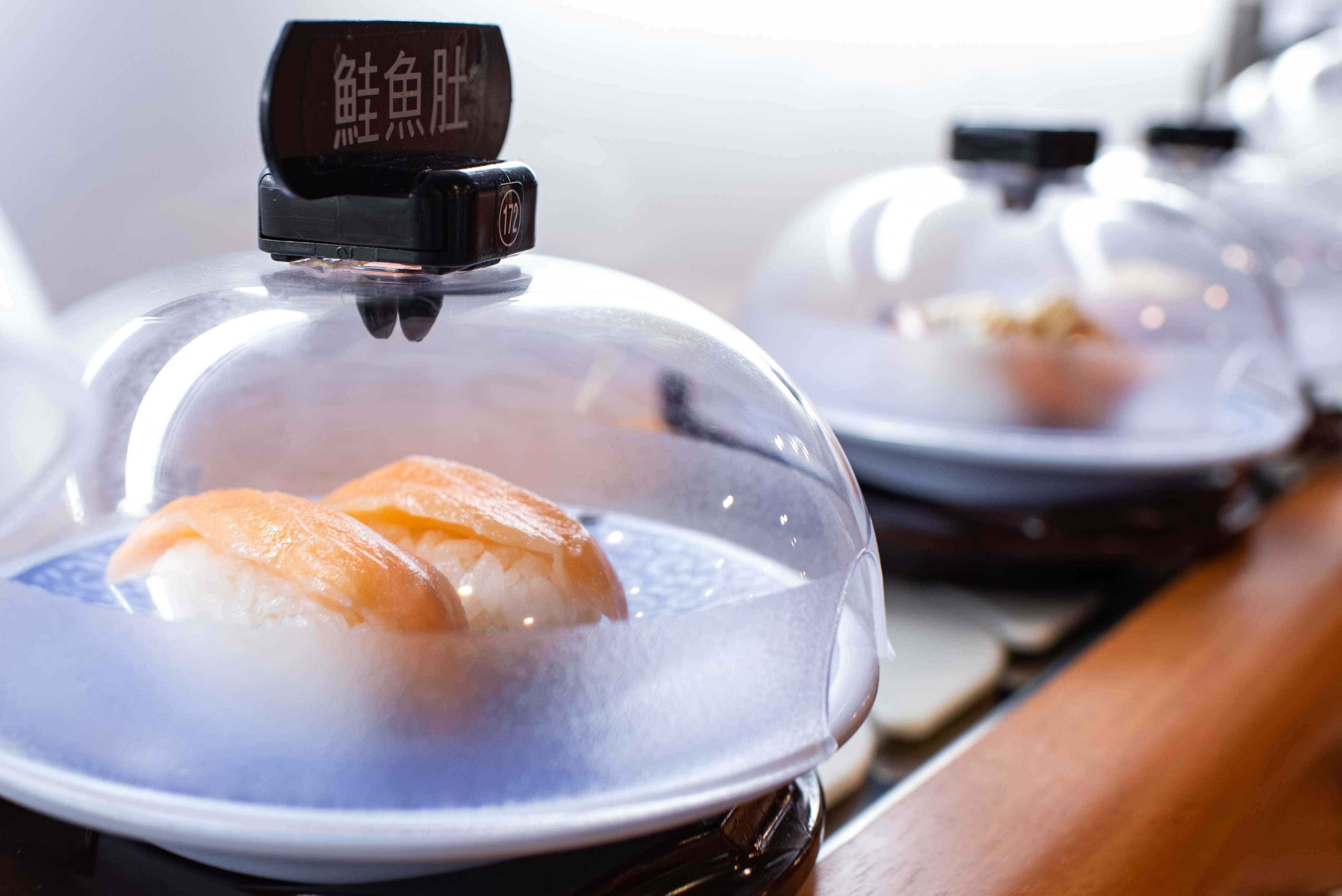 Salmon sushi at a conveyor-belt sushi restaurant in Japan. Photo: Shutterstock