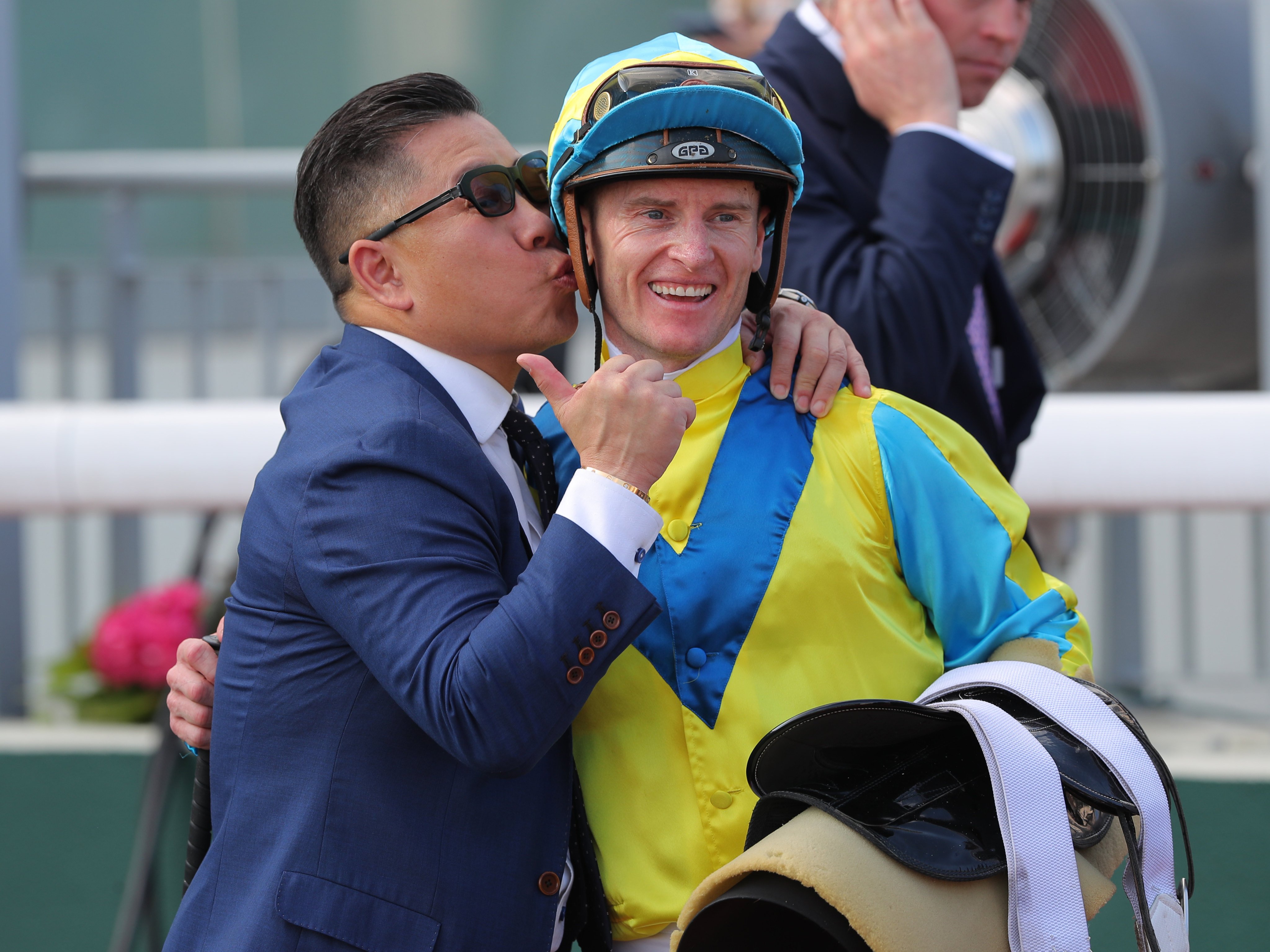 Trainer Dennis Yip kisses jockey Zac Purton after Massive Sovereign’s Hong Kong Derby success. Photos: Kenneth Chan