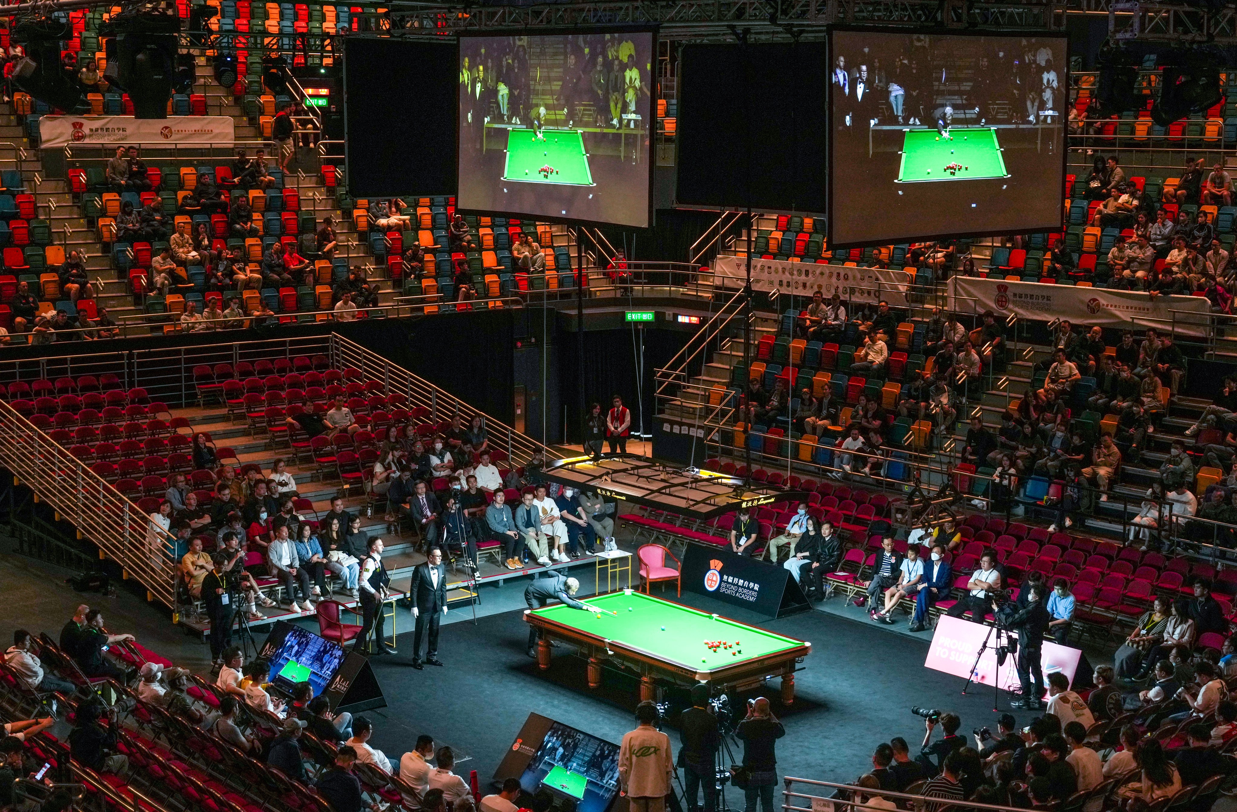 England’s Judd Trump and Jack Lisowski compete during 2024 Hong Kong Snooker All-Star Challenge at Queen Elizabeth Stadium. The red seats on the sides are some of most expensive on offer. Photo: Sam Tsang
