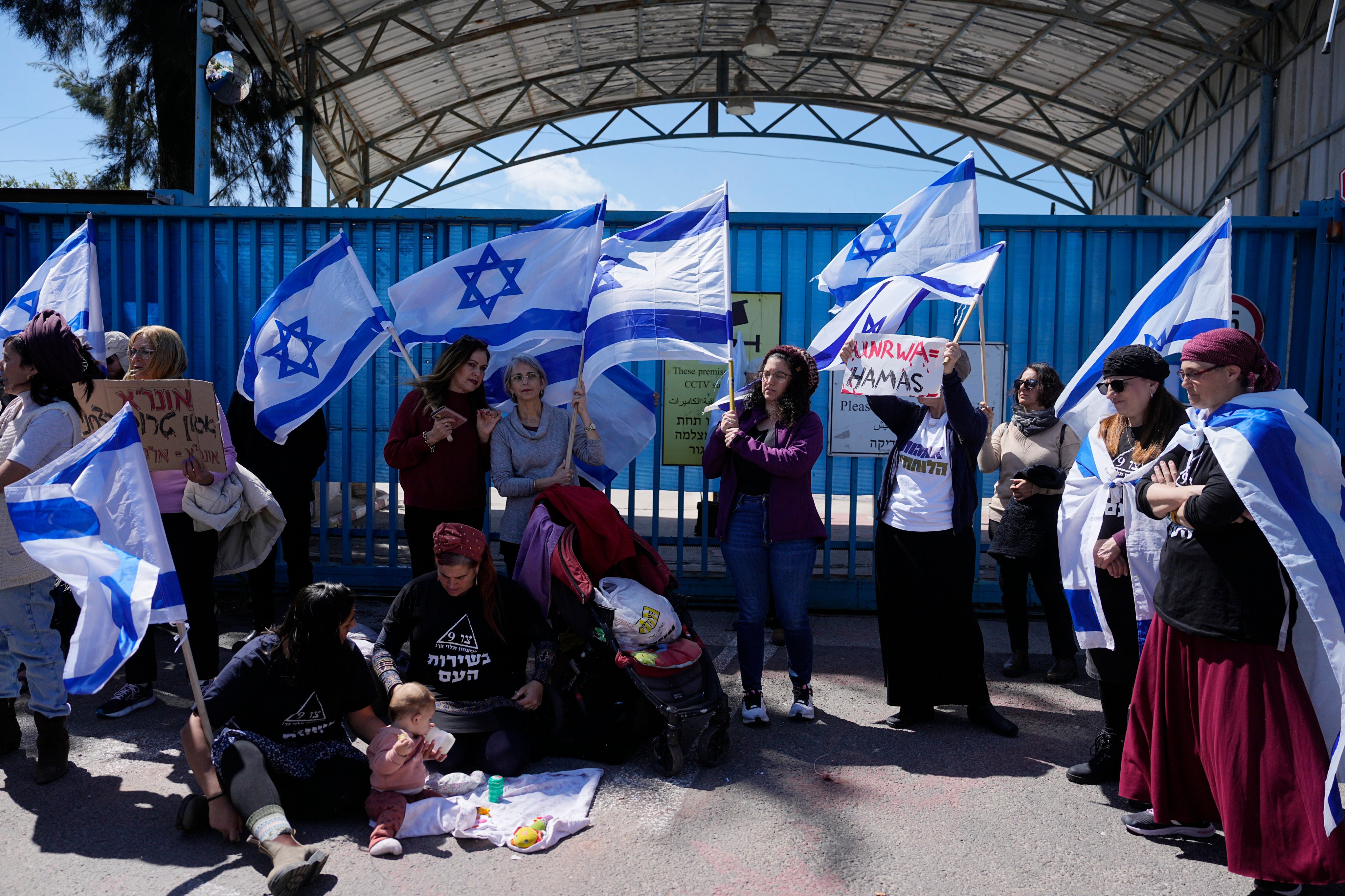 Israelis block the entrance to UNWRA, the main UN agency providing aid in Gaza, during a protest in Jerusalem. Photo: AP 