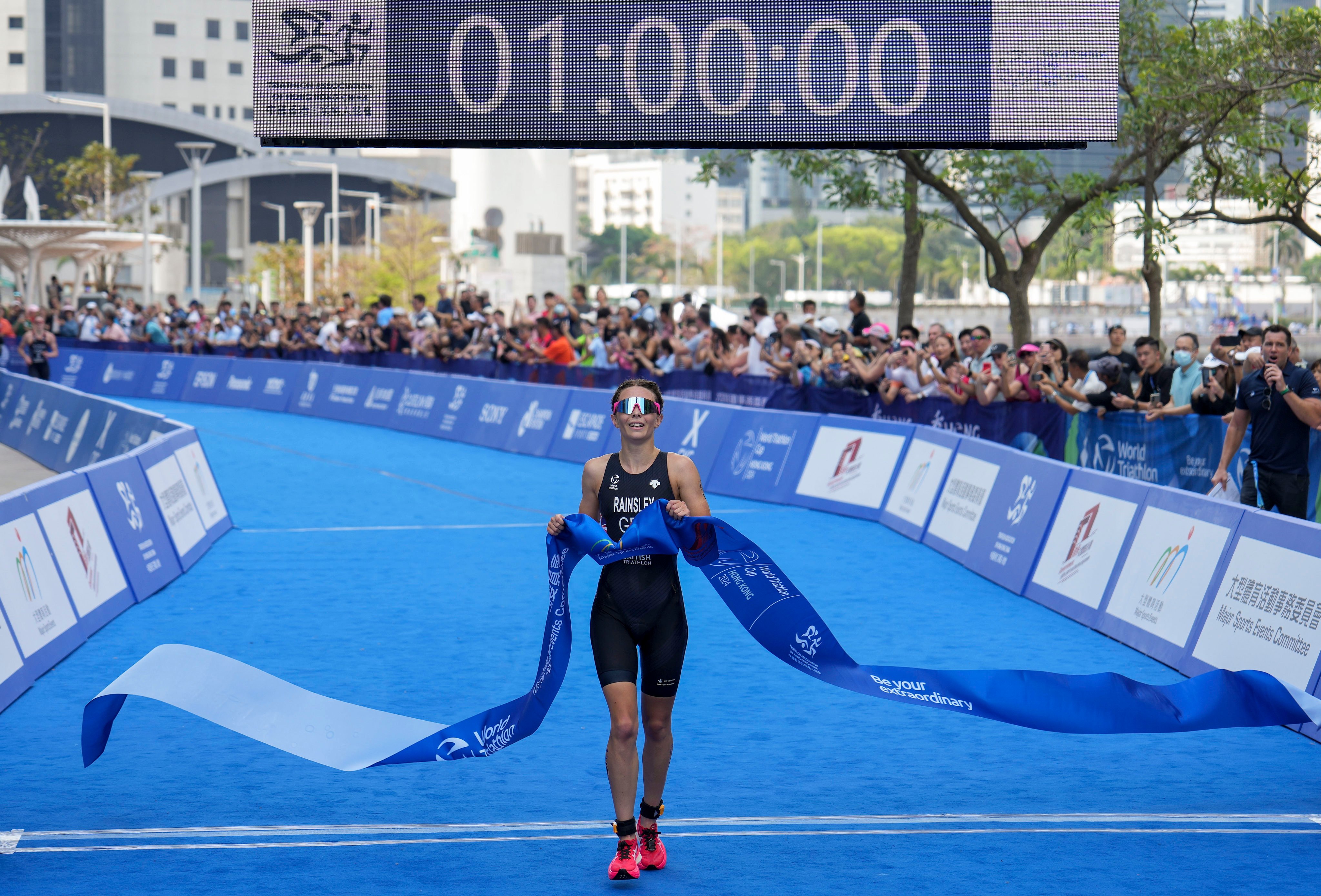 Sian Rainsley won the Hong Kong leg of the World Triathlon Cup, but the wrong national anthem was played after she received her gold medal. Photo: Elson Li