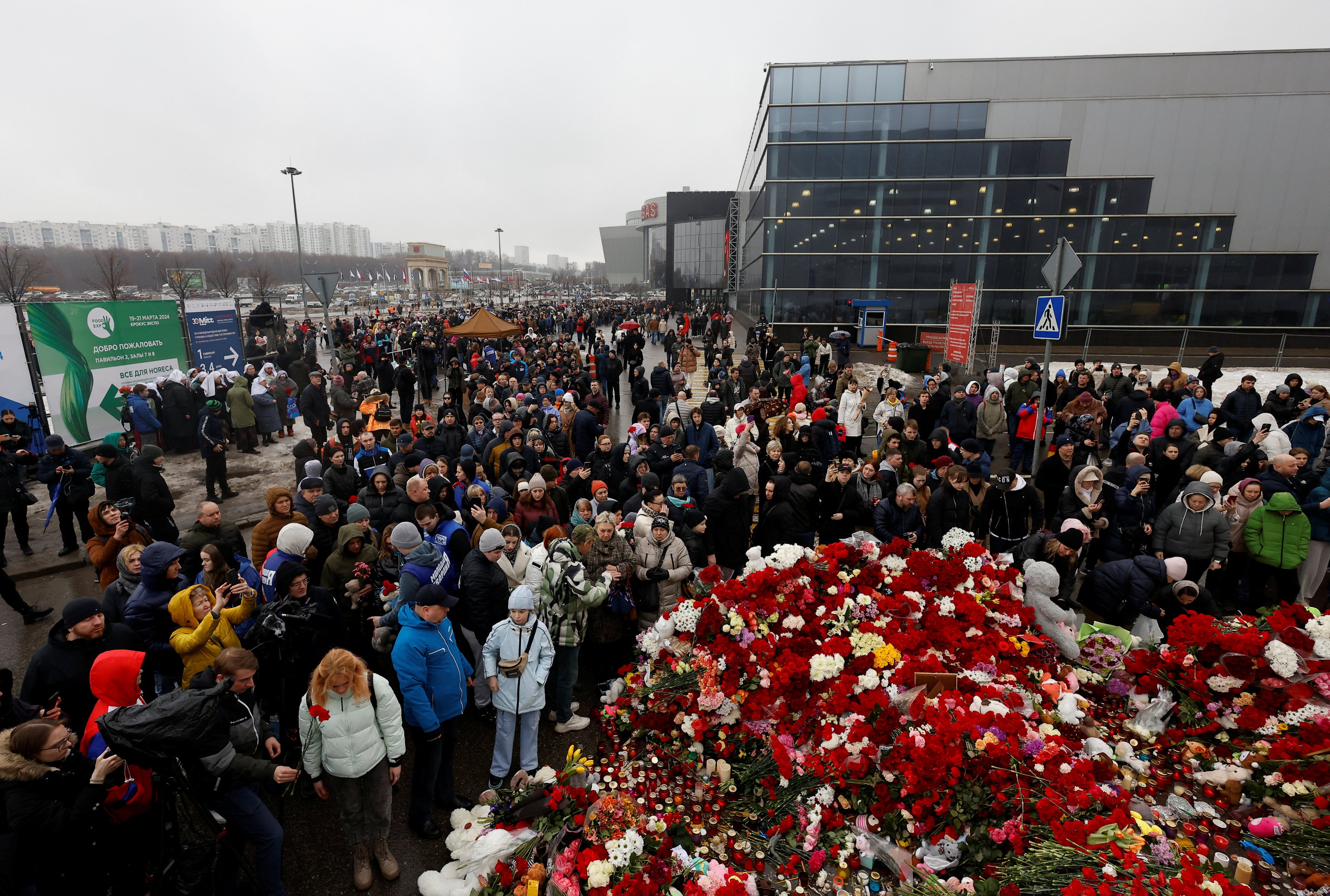 People gather at a makeshift memorial to the victims of Friday’s attack, outside the Crocus City Hall in Moscow.  Photo: Reuters 