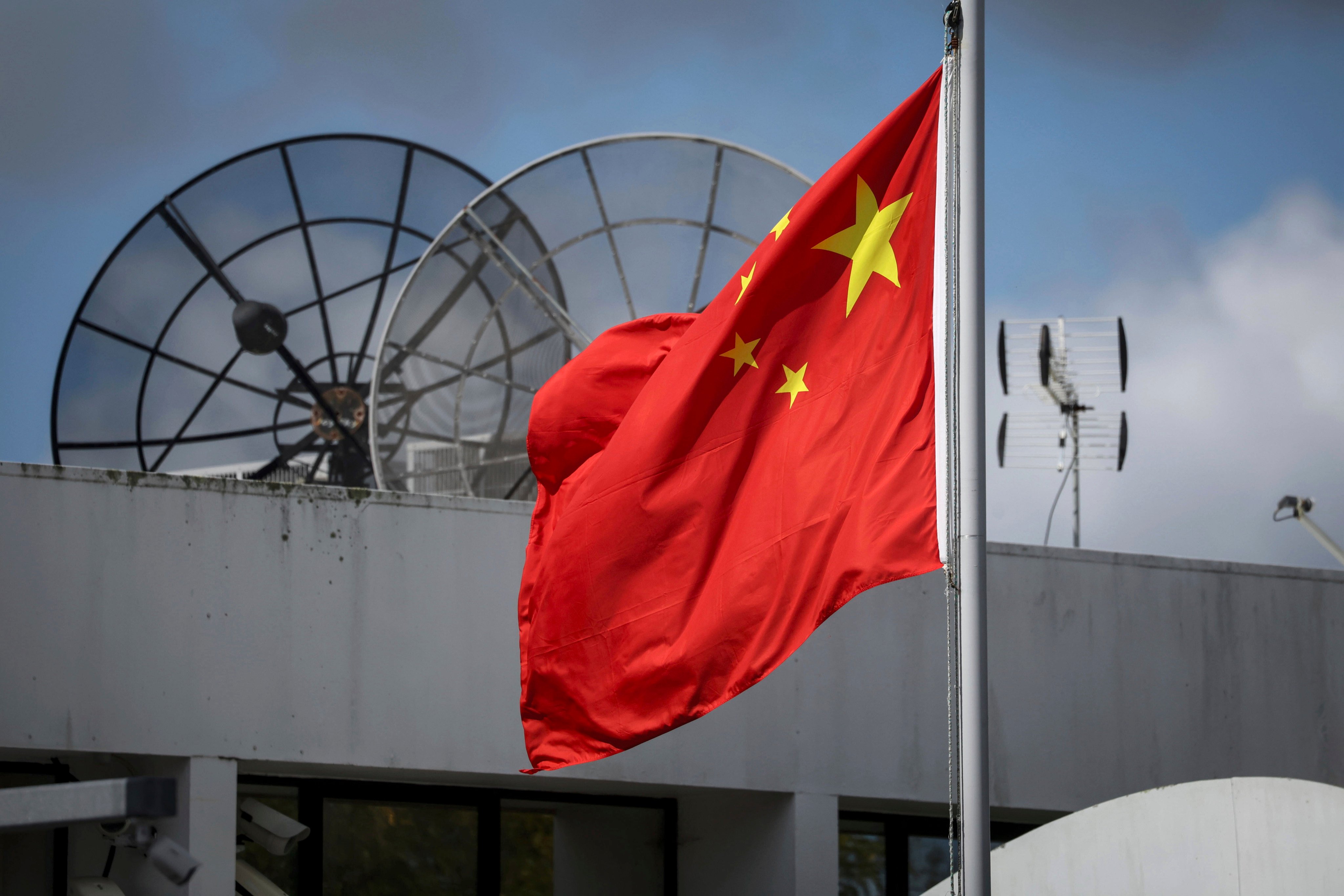 The Chinese flag flies at the Chinese consulate in Auckland, New Zealand, on Tuesday. Photo: New Zealand Herald via AP