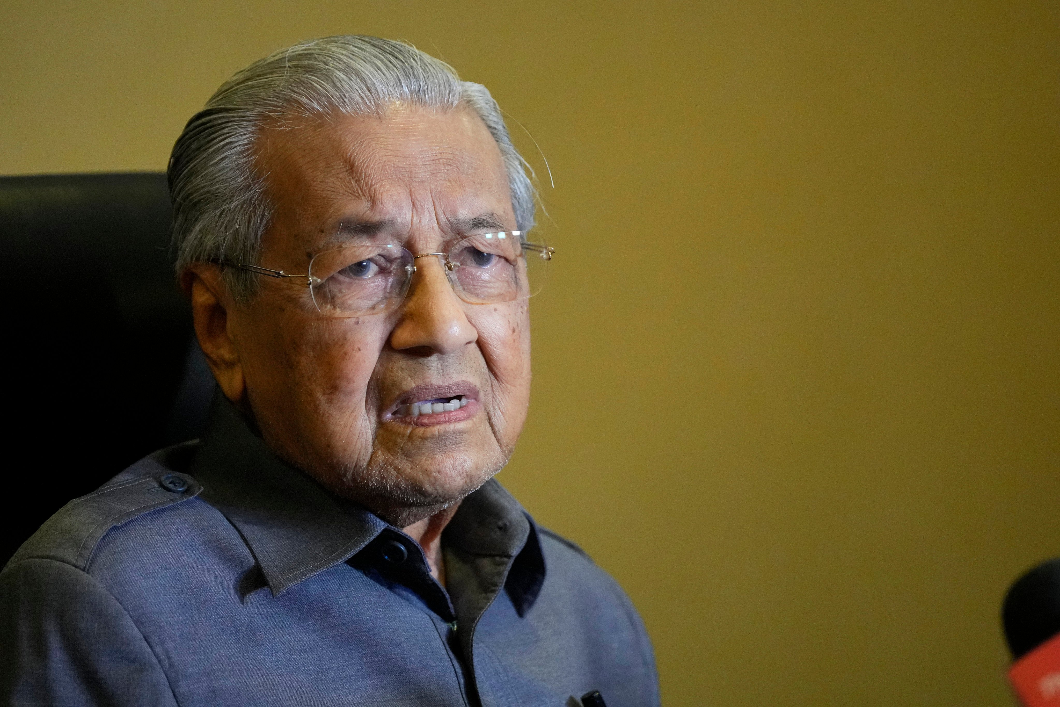 Former Malaysian Prime Minister Mahathir Mohamad speaks at his office in Putrajaya in January. Photo: AP