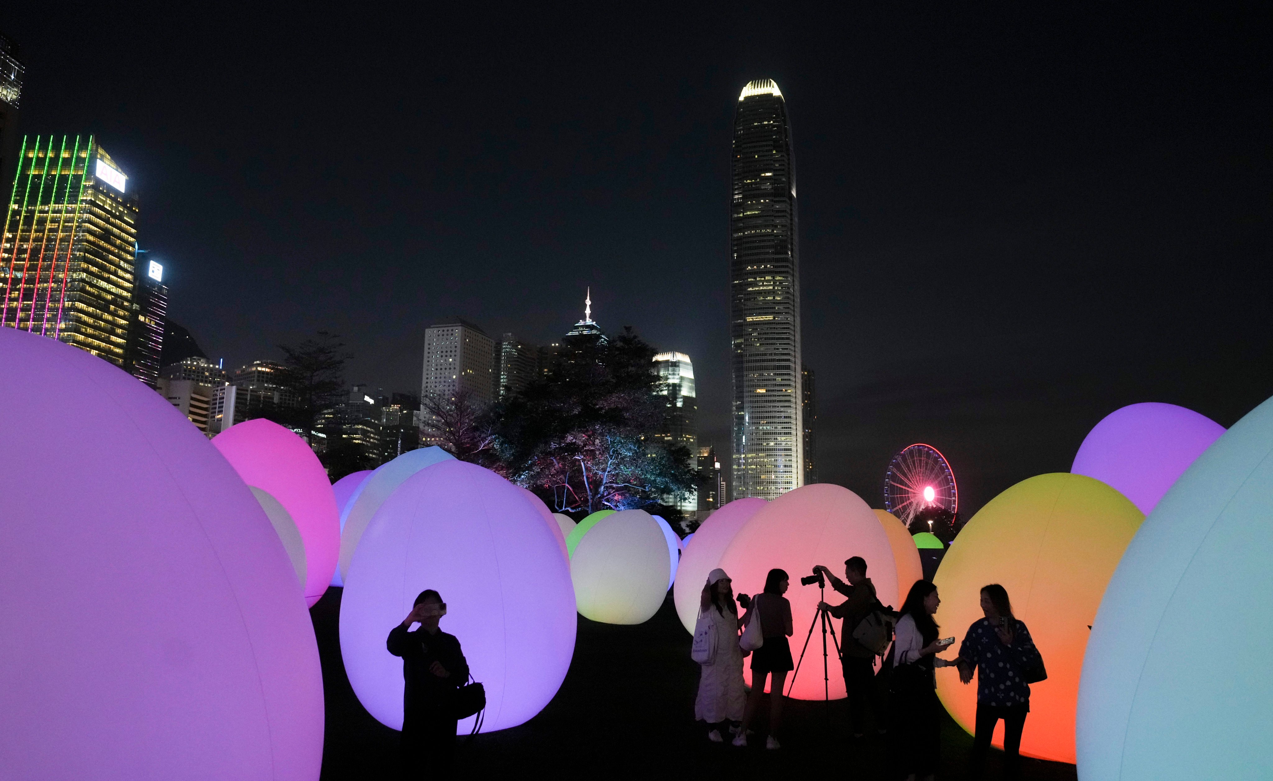 Revellers can take in the sights of the “Continuous” exhibition at Victoria Harbour during the Easter break. Photo: Sam Tsang