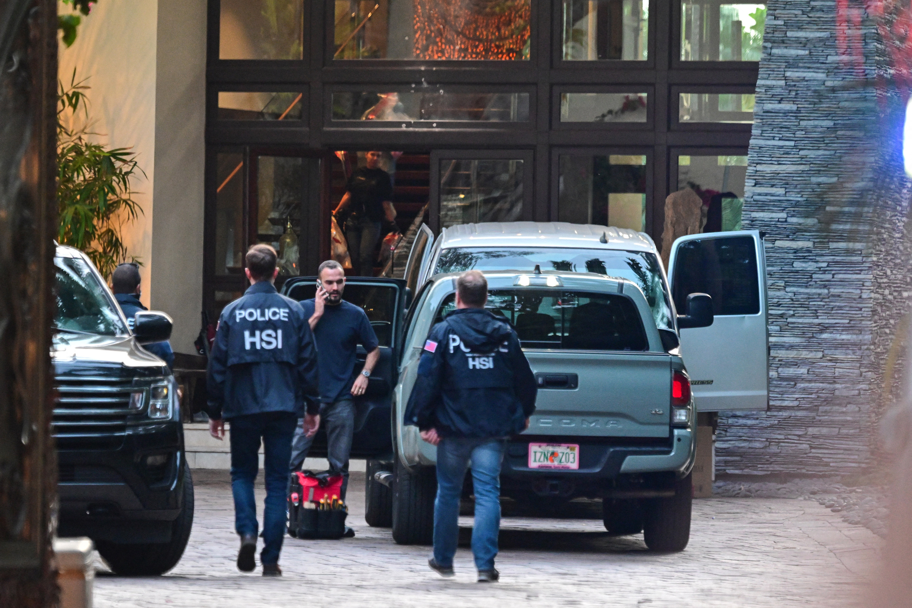 Homeland Security agents at the entrance of Sean “Diddy” Combs’ home in Miami, Florida on Monday. Photo: AFP / Getty Images / TNS