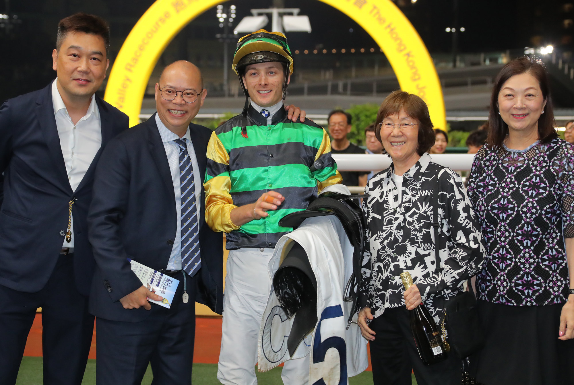 Trainer Chris So (second from left), jockey Harry Bentley and connections celebrate Our Lucky Glory’s win.