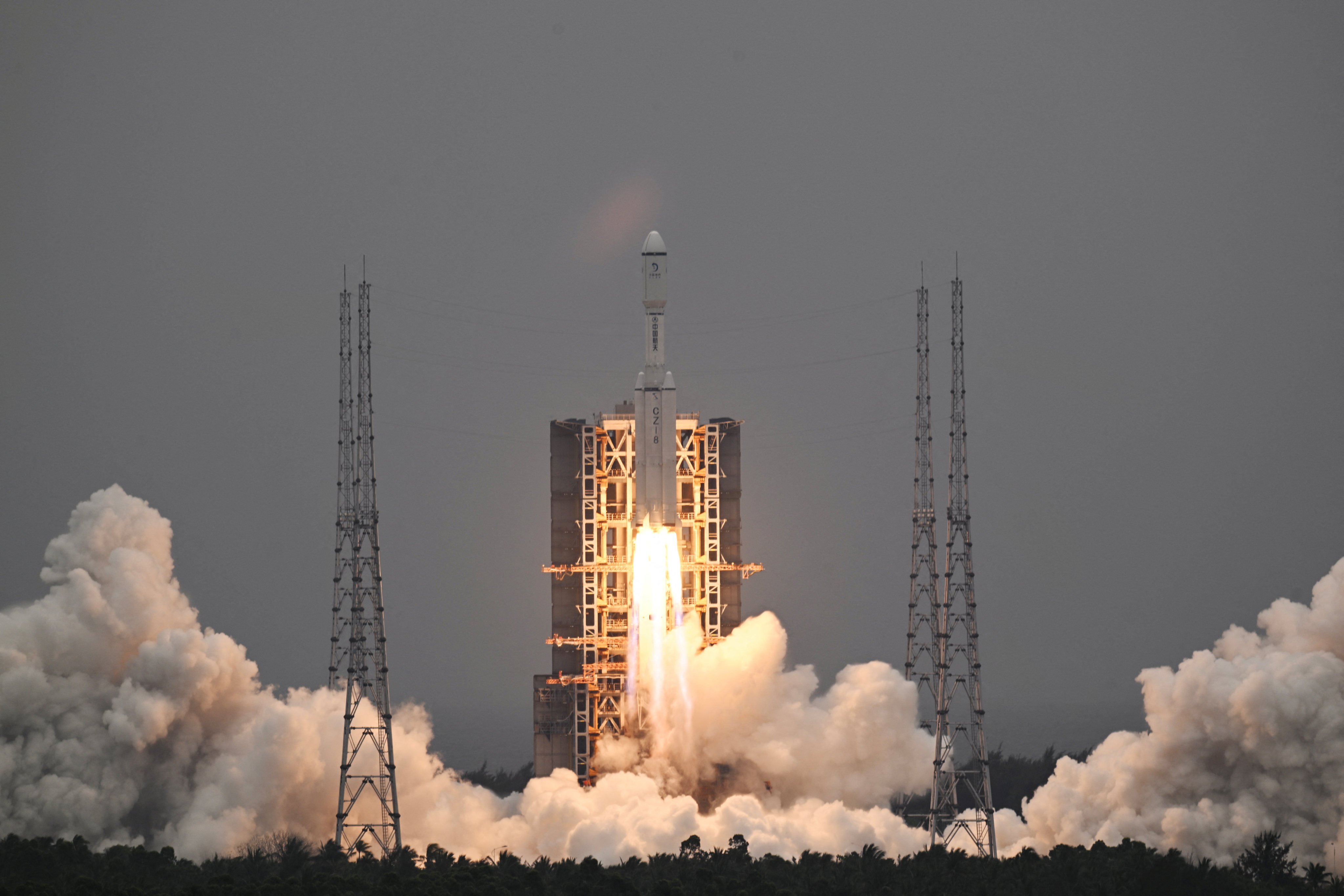 A Long March-8 rocket, carrying the relay satellite Queqiao-2 for Earth-moon communications, blasts off at the Wenchang Space Launch Centre on March 20. Photo: Reuters