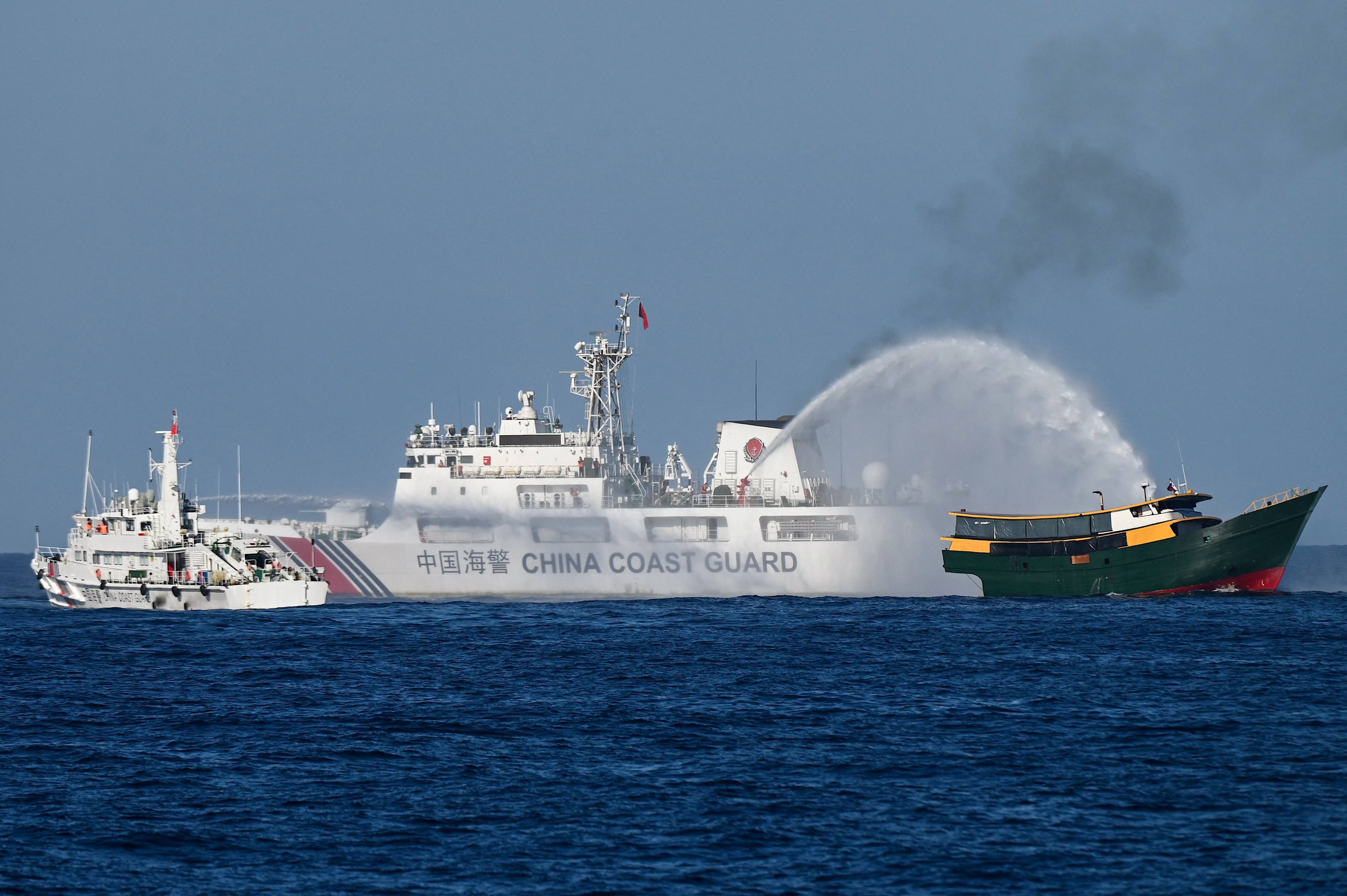 Chinese coastguards fire water cannons at a Philippine supply ship in a confrontation earlier this month near the Second Thomas Shoal. Photo: AFP