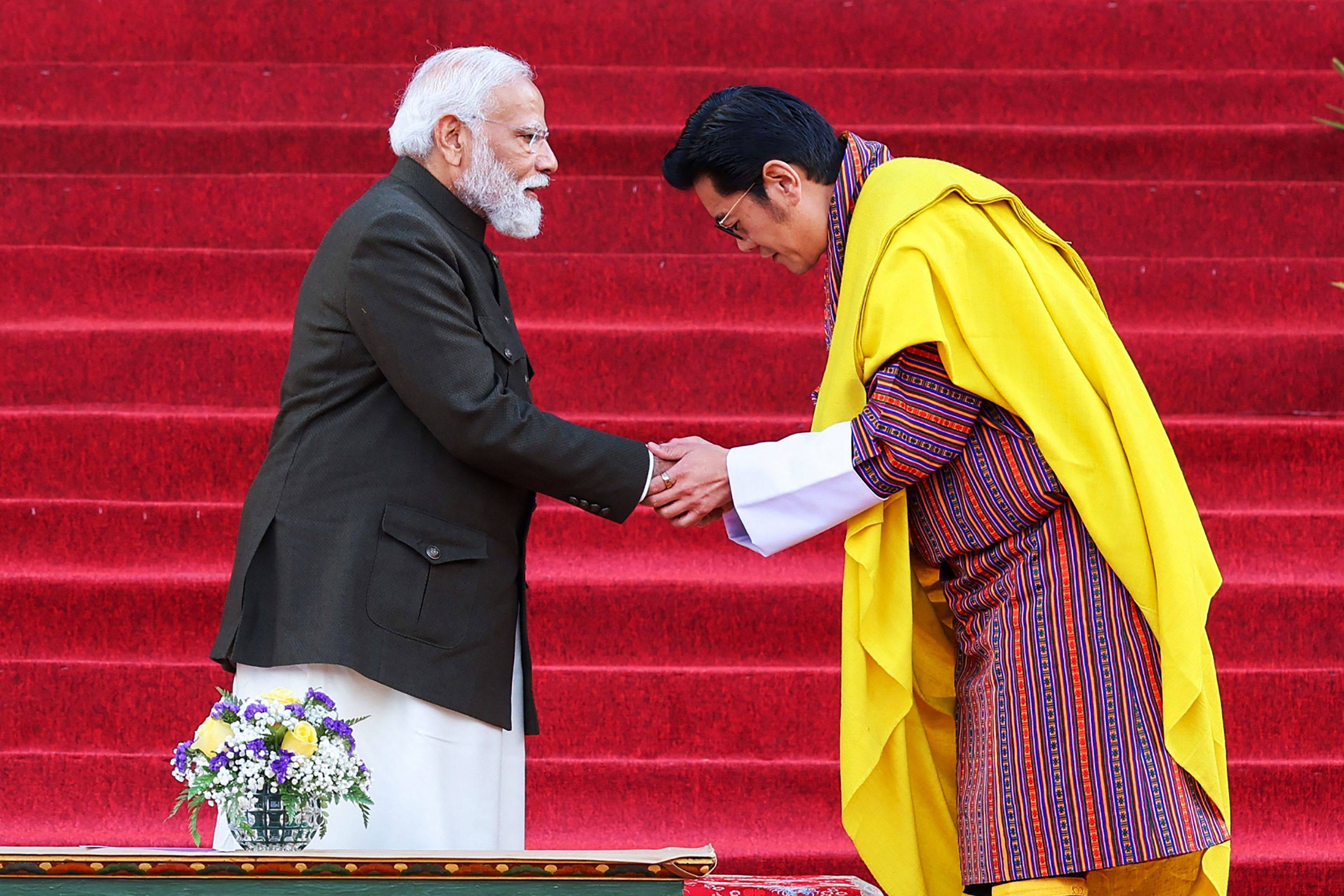 India’s Prime Minister Narendra Modi and Bhutan’s King Jigme Khesar Namgyel Wangchuck greet each other during the conferment ceremony of the Order of the Druk Gyalpo award to Modi in Bhutan’s capital Thimpu on March 22. Photo: AFP
