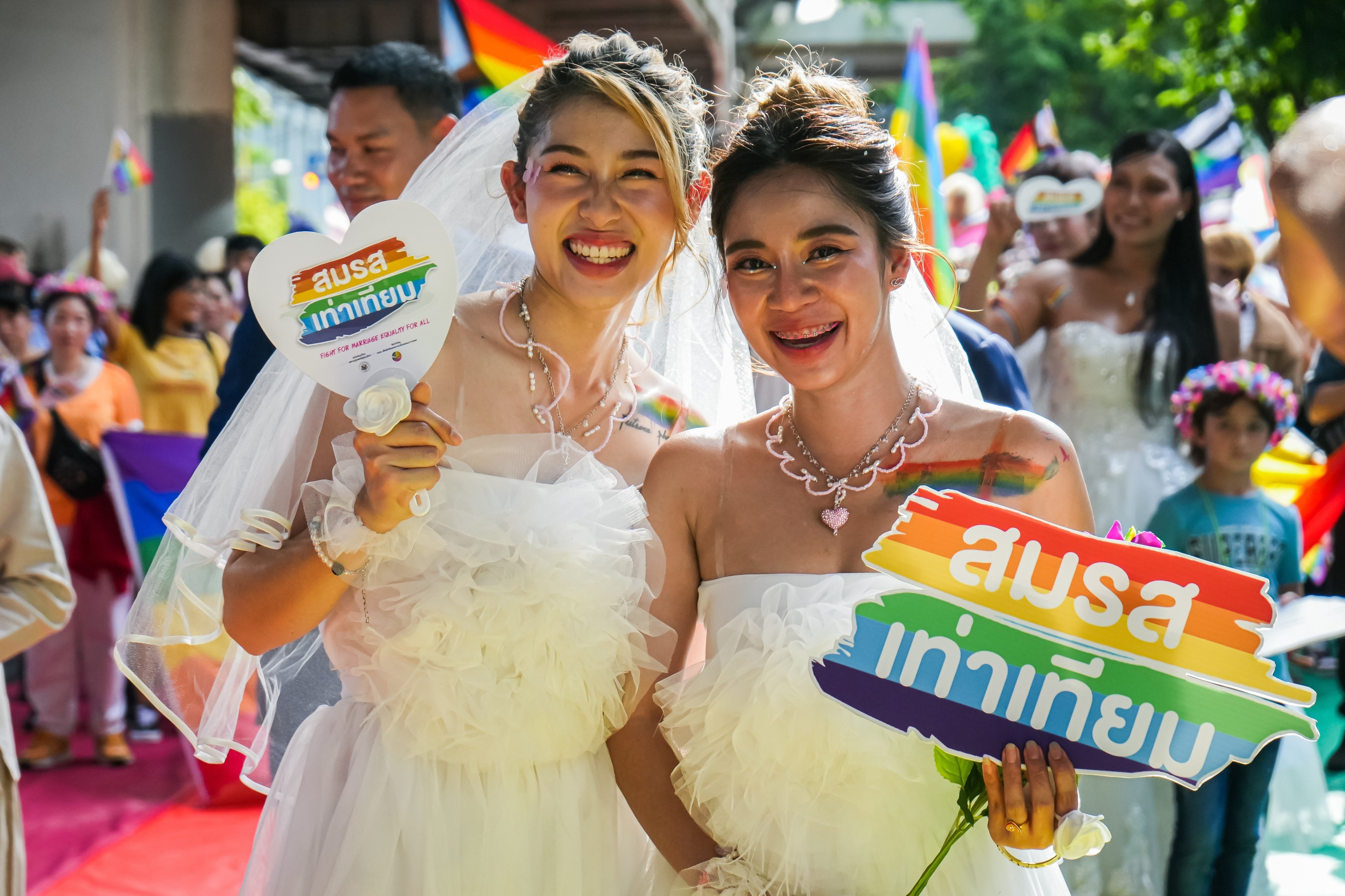 A same-sex couple participates in a pride march through central Bangkok on June 4, 2023. Photo: Shutterstock 