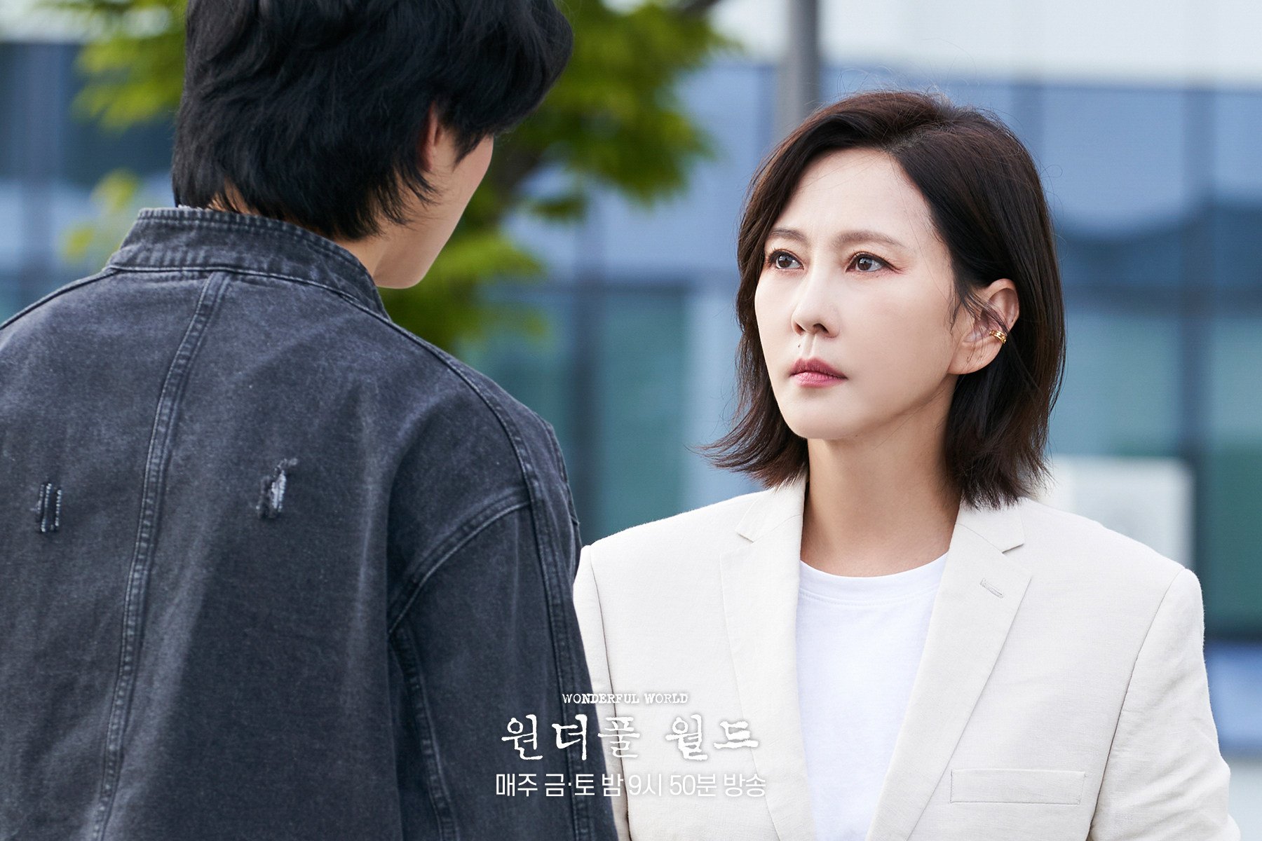Cha Eun-woo (left) and Kim Nam-joo as the mysterious Kwon Seon-yul and author Eun Soo-hyun in a still from Wonderful World. At midseason the pieces are falling into place for a satisfying conclusion to the Disney+ K-drama.