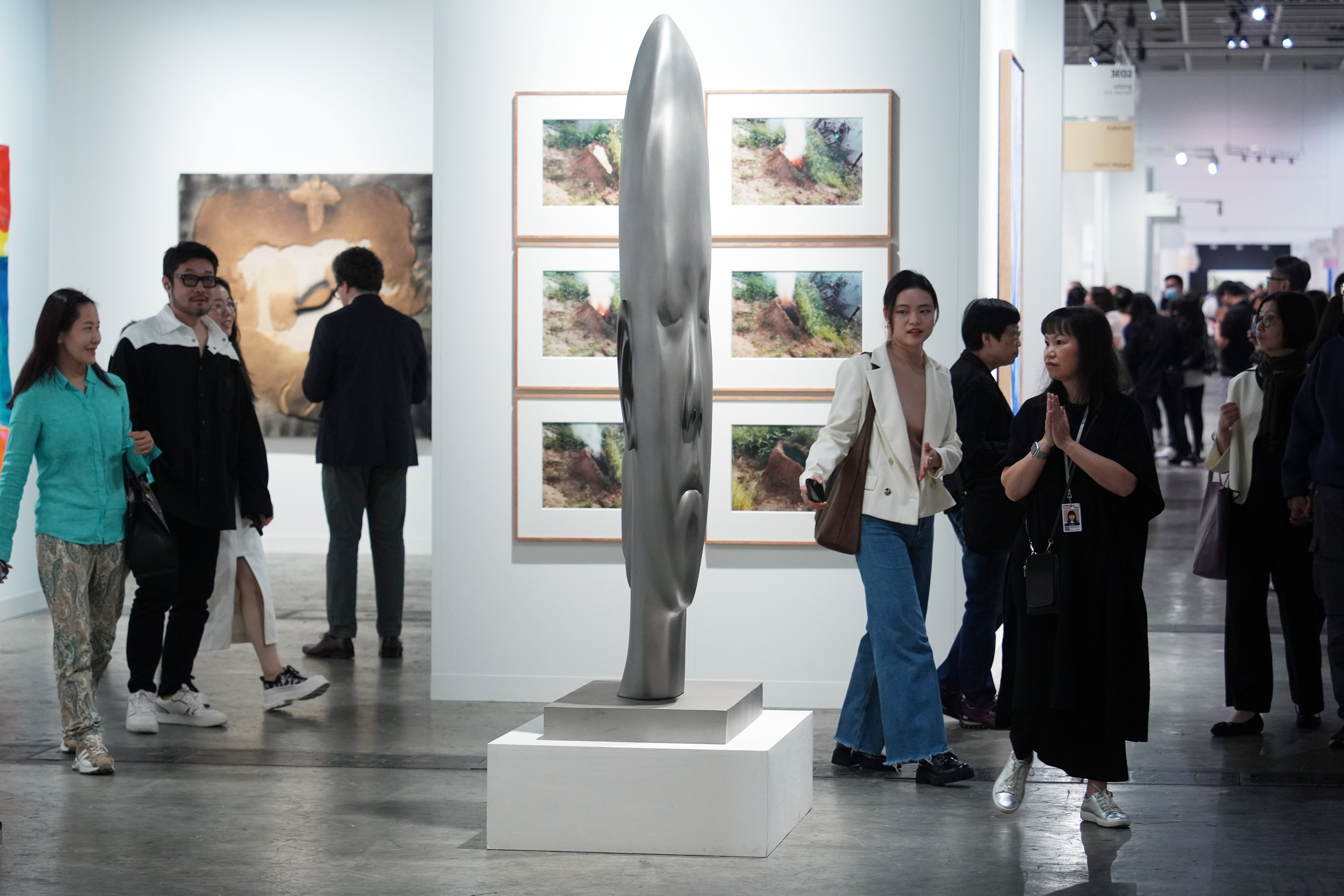 Visitors admire artworks at Art Basel at the Hong Kong Convention and Exhibition Centre in Wan Chai, Hong Kong, on March 27, 2024. Photo: Eugene Lee