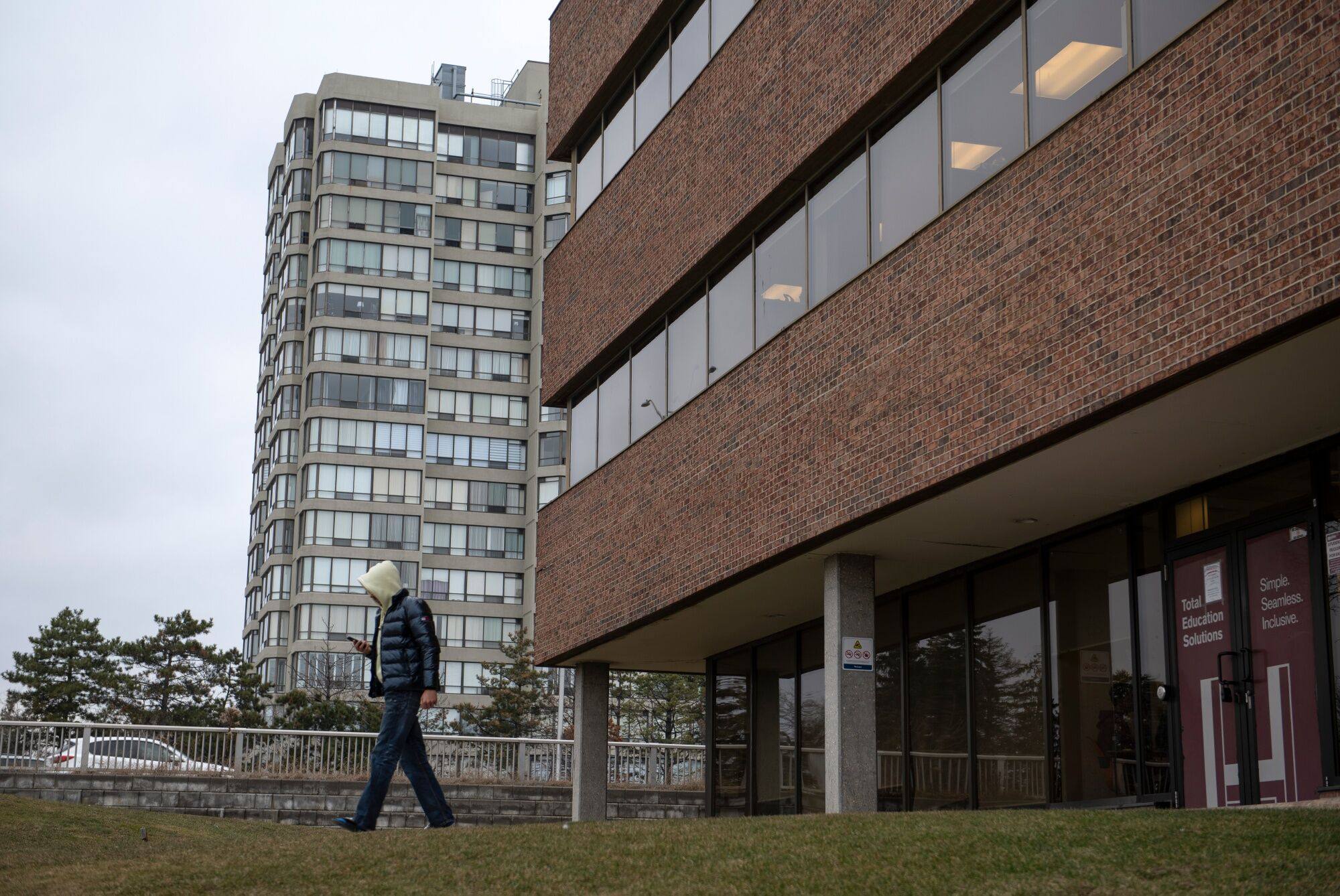 A student exits Hanson College’s Brampton campus in Ontario, Canada. Photo: Bloomberg
