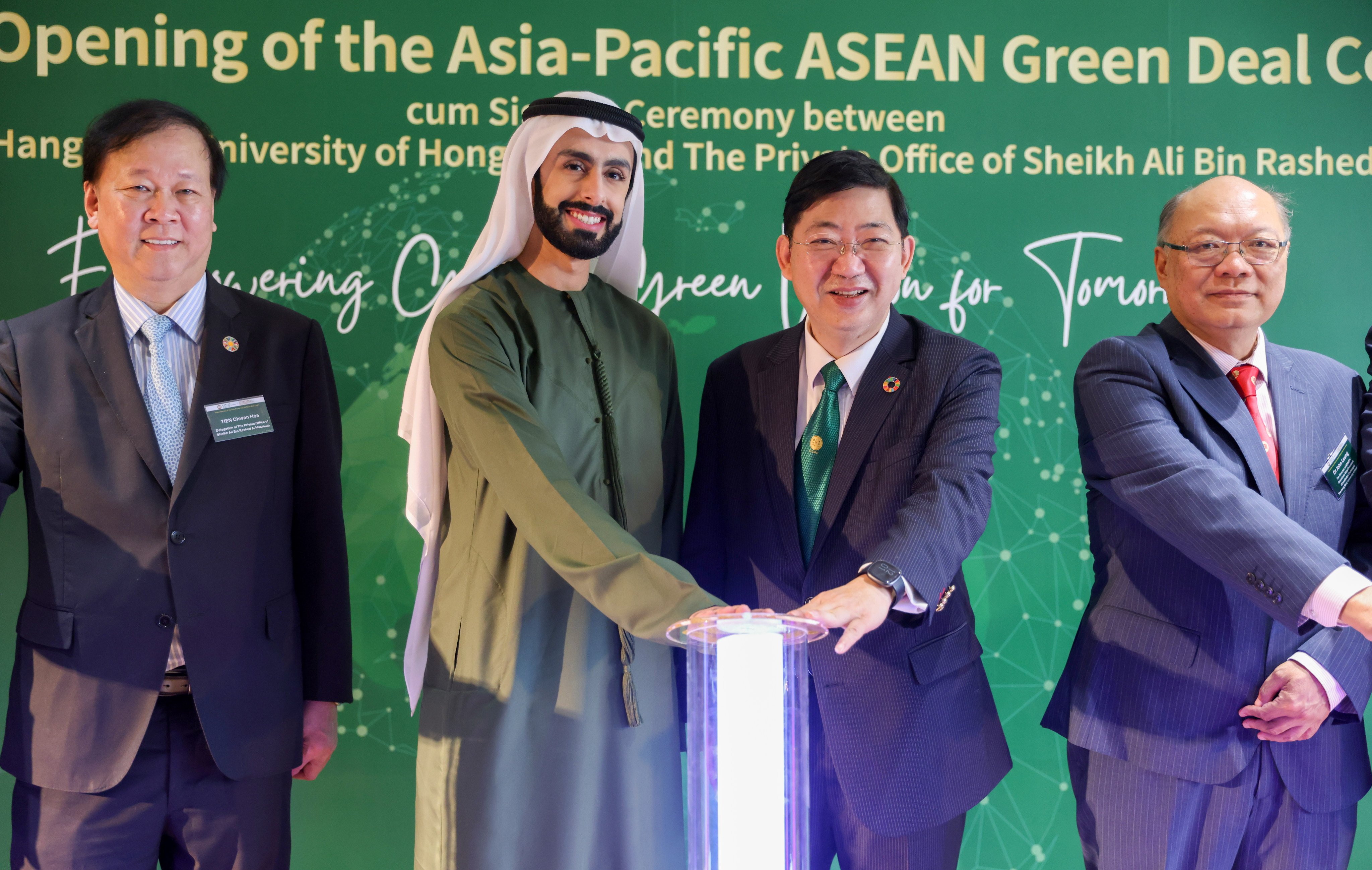 Sheikh Ali Rashed Ali Saeed Al Maktoum (second from left) attends a media event with his office’s director of international strategic relations William Tien (far left). Photo: Yik Yeung-man