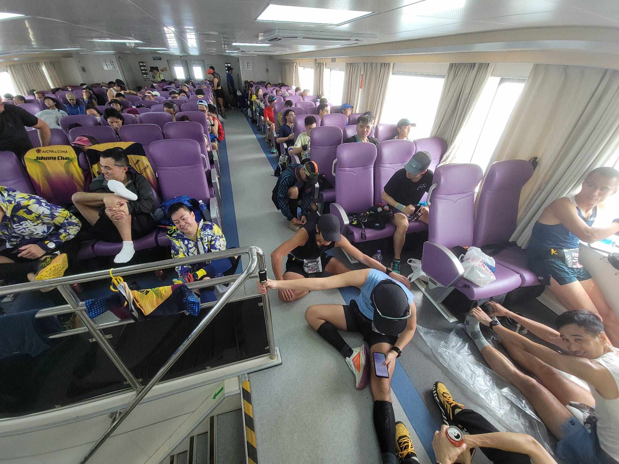 Runners of the 4 Trail Ultra Loop pack on to the ferry from Tuen Mun to Lantau Island. Photo: No Race No Goal