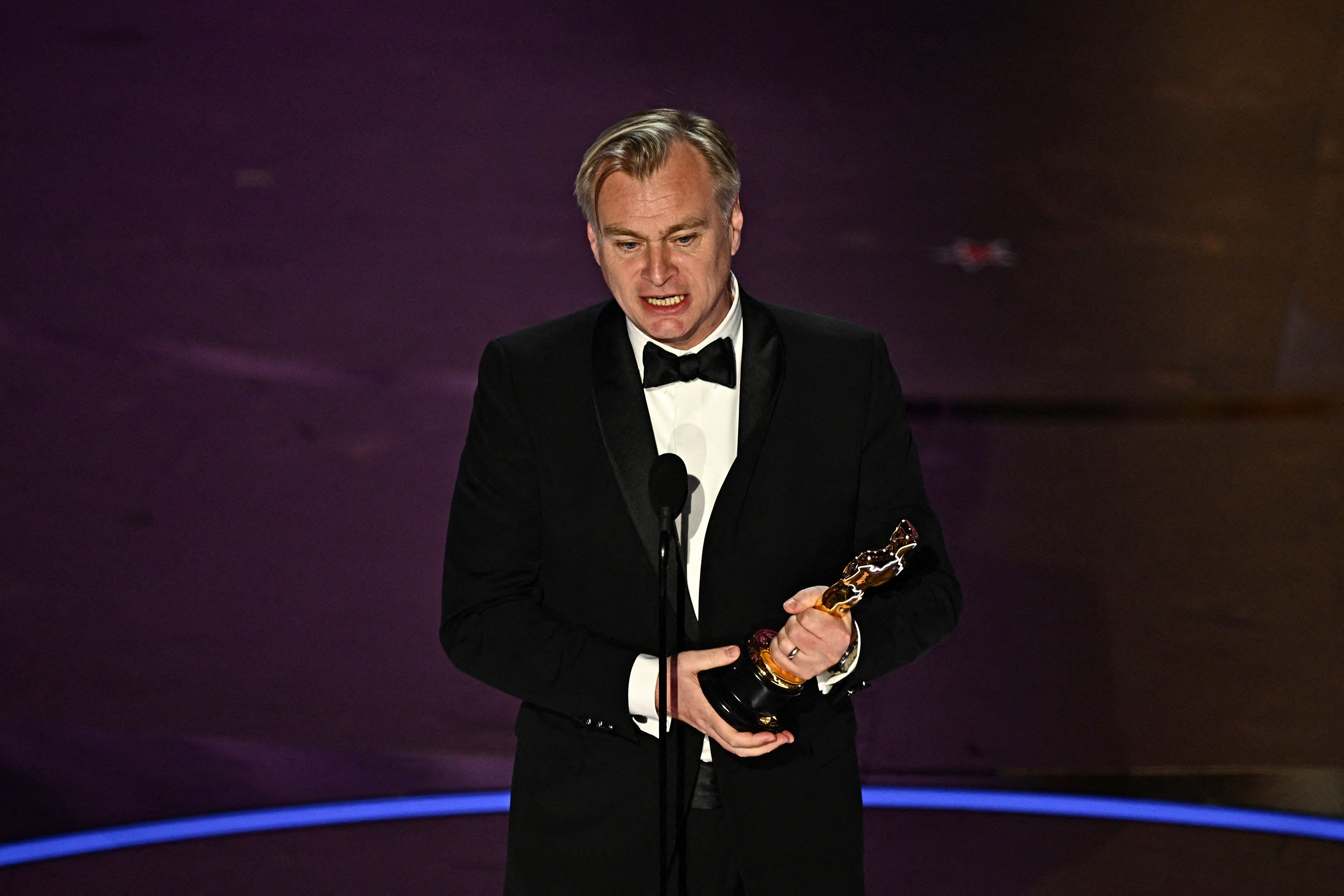 Christopher Nolan accepts the best director Oscar for Oppenheimer in Hollywood, California on March 10. Photo: AFP / Getty Images / TNS