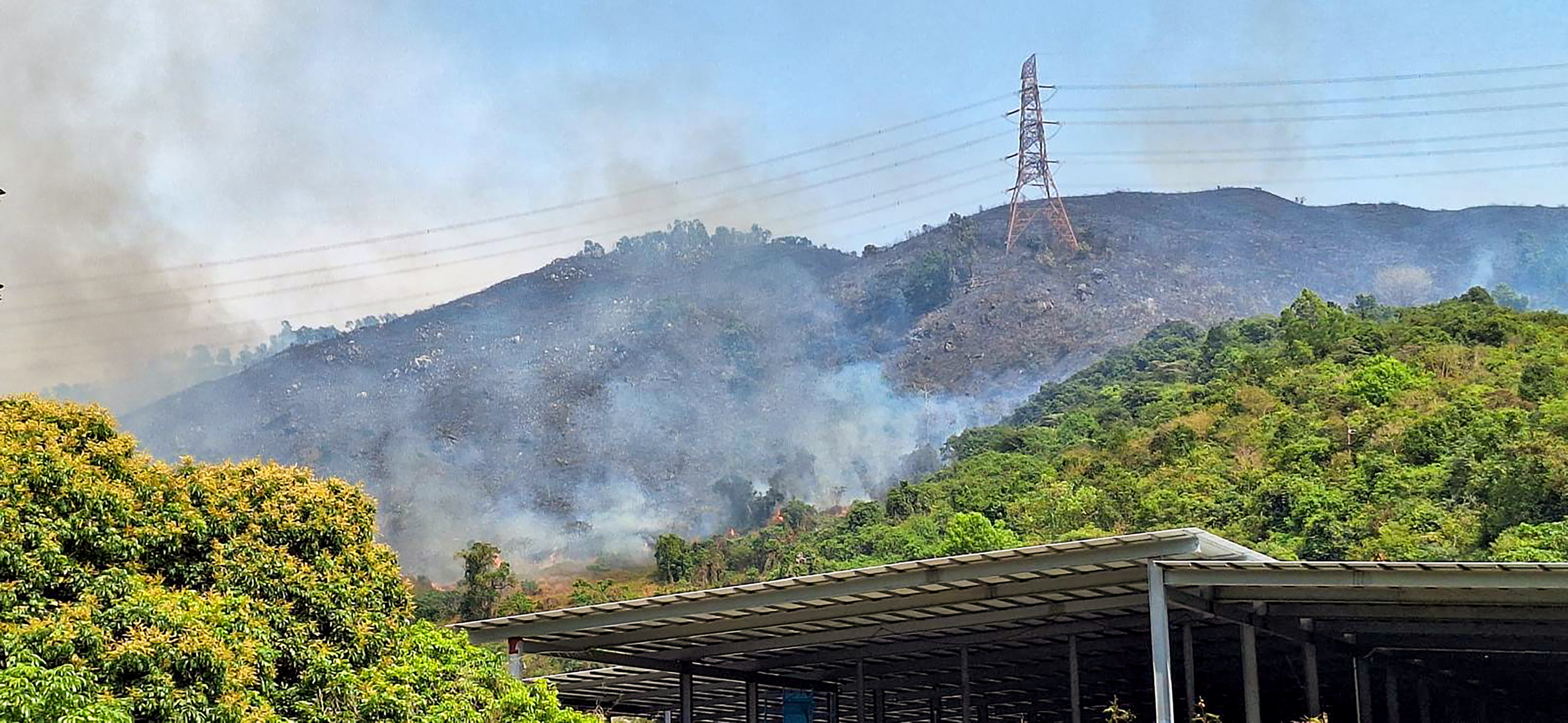 A hill fire in Yuen Long affected electricity pylons, the company said. Photo: CLP