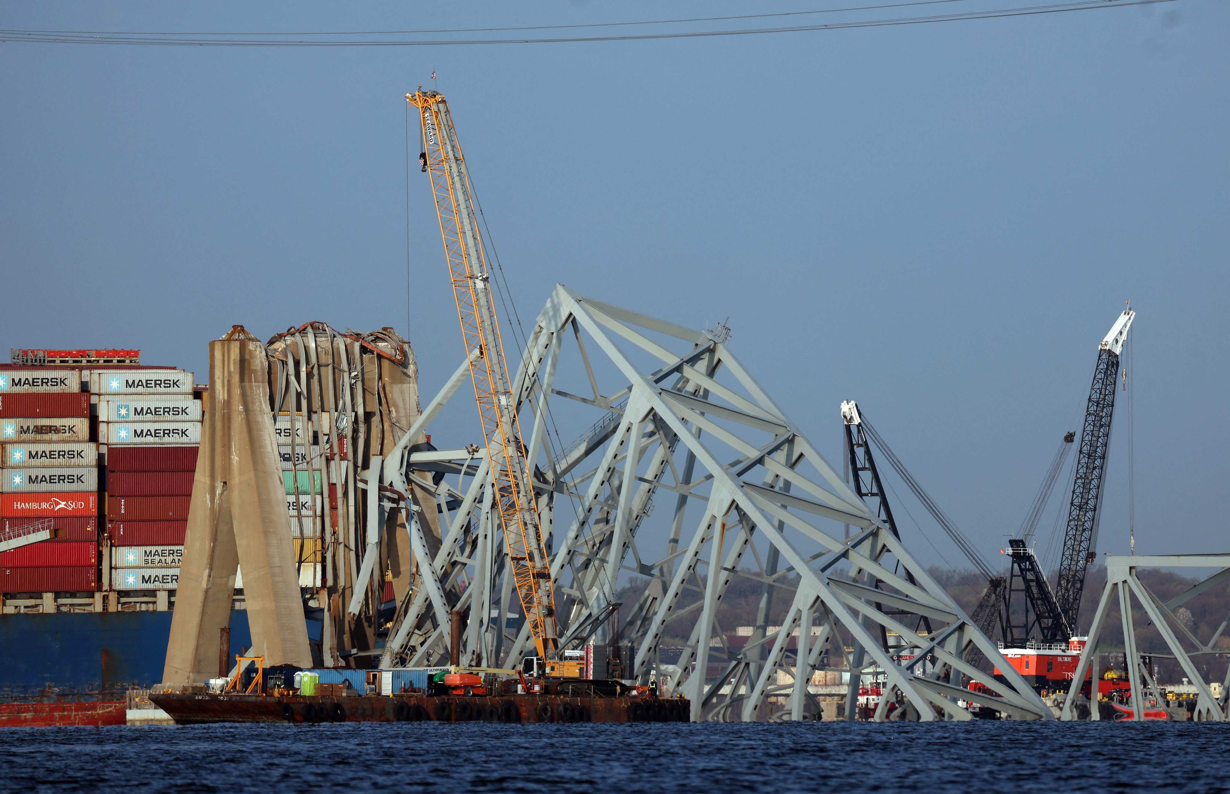 Cranes work on clearing debris from the Francis Scott Key Bridge in Baltimore, Maryland, on Friday. Photo: AFP