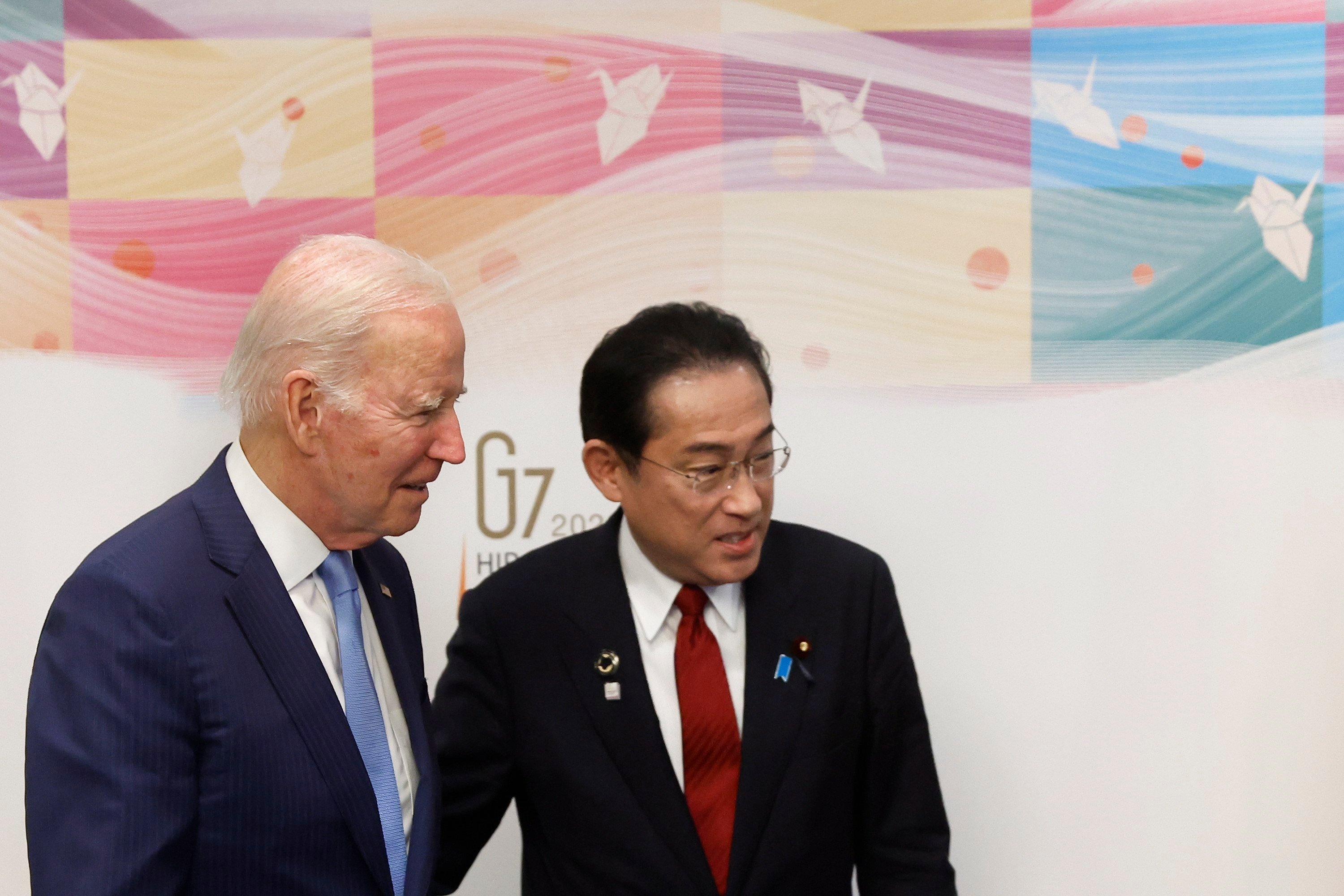 US President Joe Biden and Japanese Prime Minister Fumio Kishida speak ahead of the G7 Hiroshima Summit in Hiroshima, Japan, in May 2023. Photo: EPA-EFE/Pool