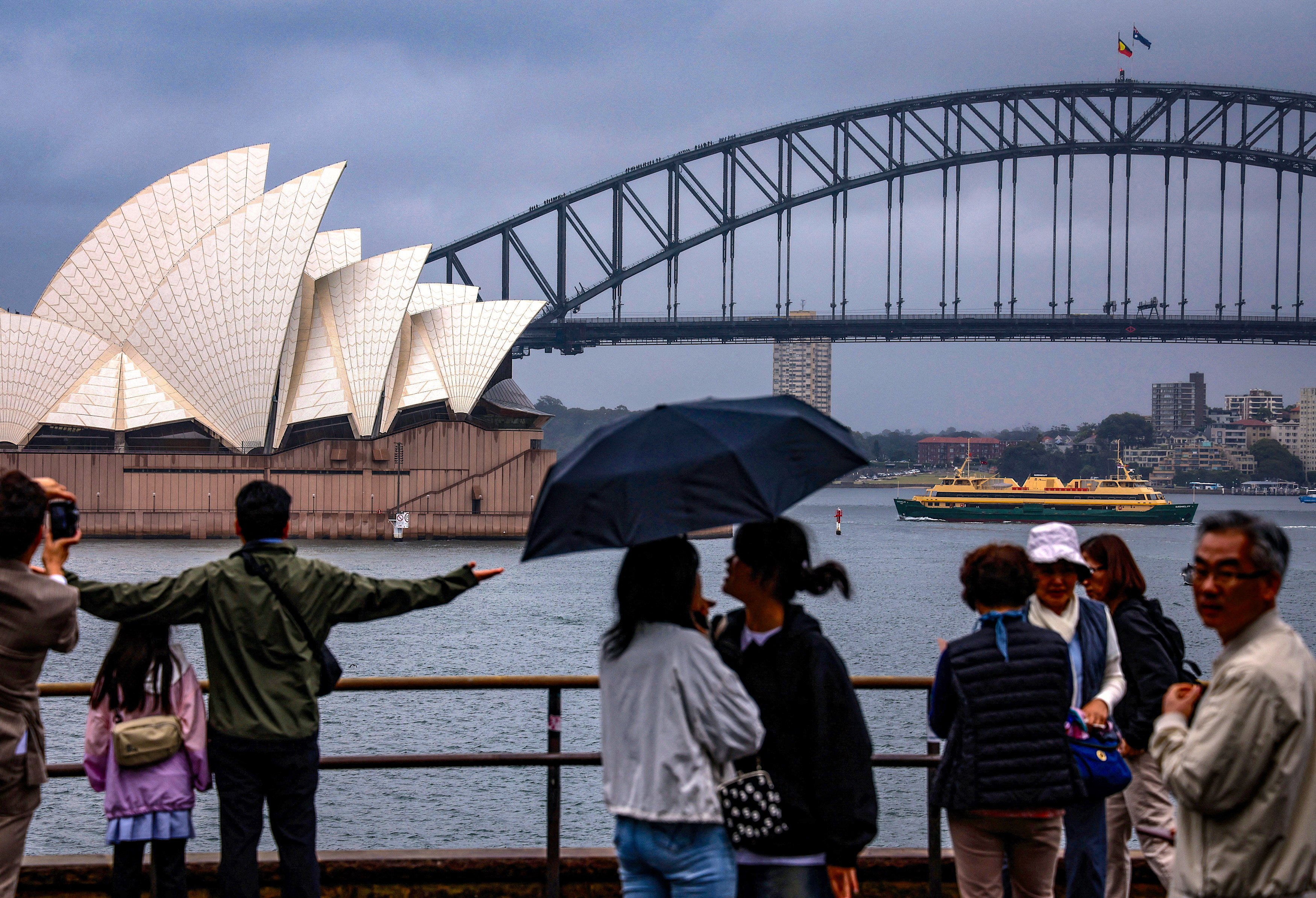 Sydney’s Opera House and Harbour Bridge. Fewer than five applications for Australia’s bespoke migration pathway have been rejected in its second year. Photo: AFP