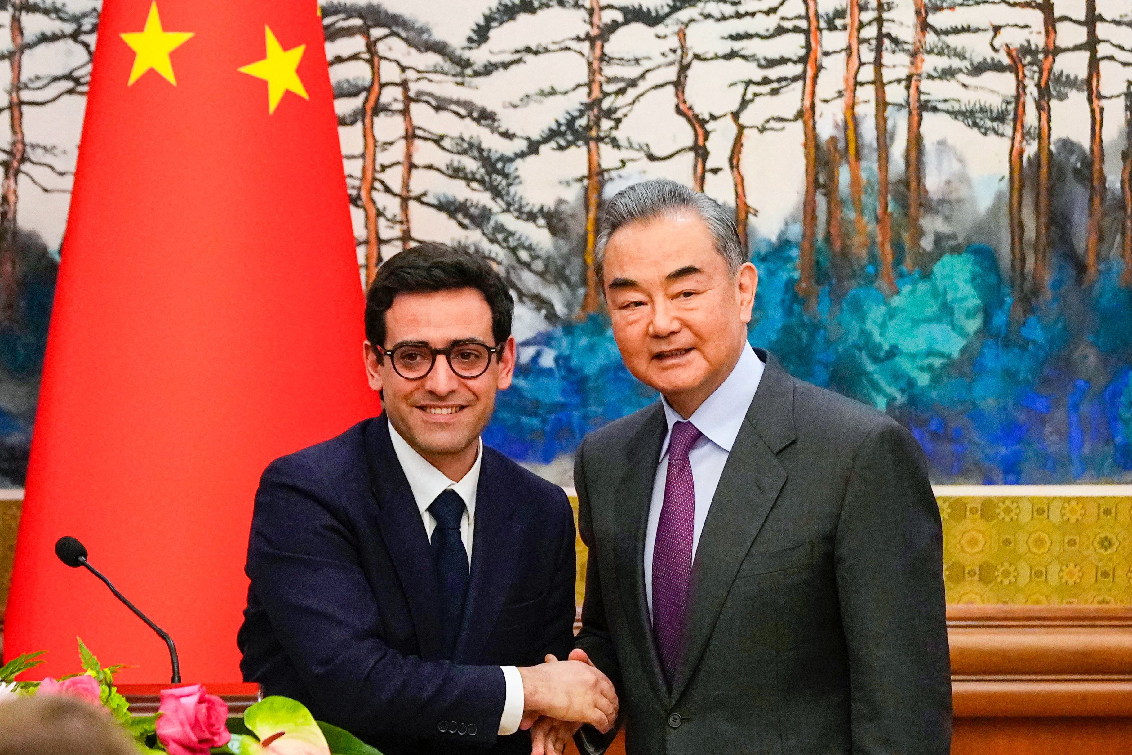 French and Chinese Foreign Ministers Stéphane Séjourné and Wang Yi pictured at their joint press conference in Beijing.  Photo: AFP