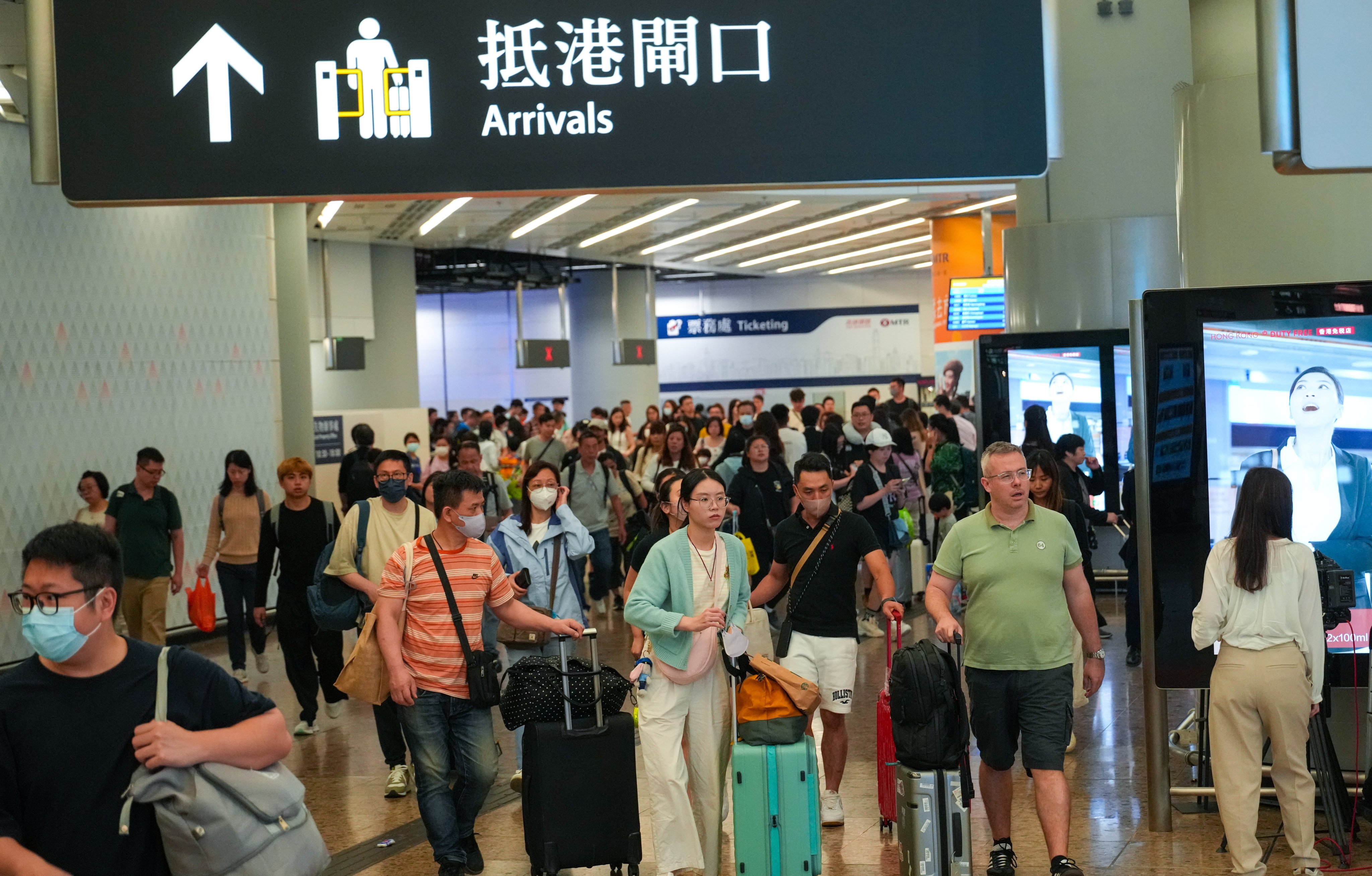 Travellers at West Kowloon station. Outbound trips by residents have risen 16 per cent during this year’s Easter break against 2018 levels. Photo: Sam Tsang