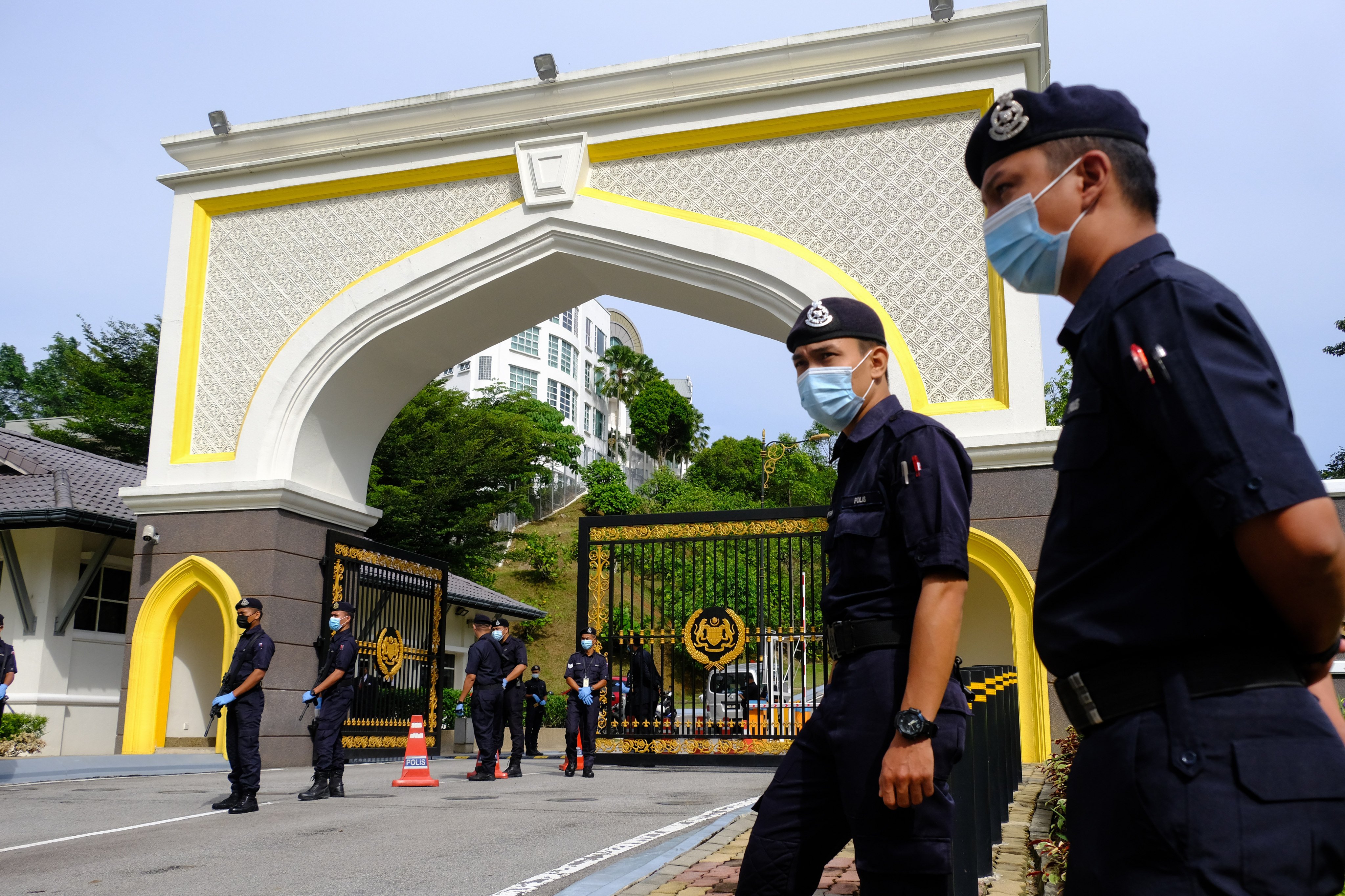Police officers outside the main entrance of the Istana Negara palace in Kuala Lumpur on October 13, 2020. Photo: Bloomberg