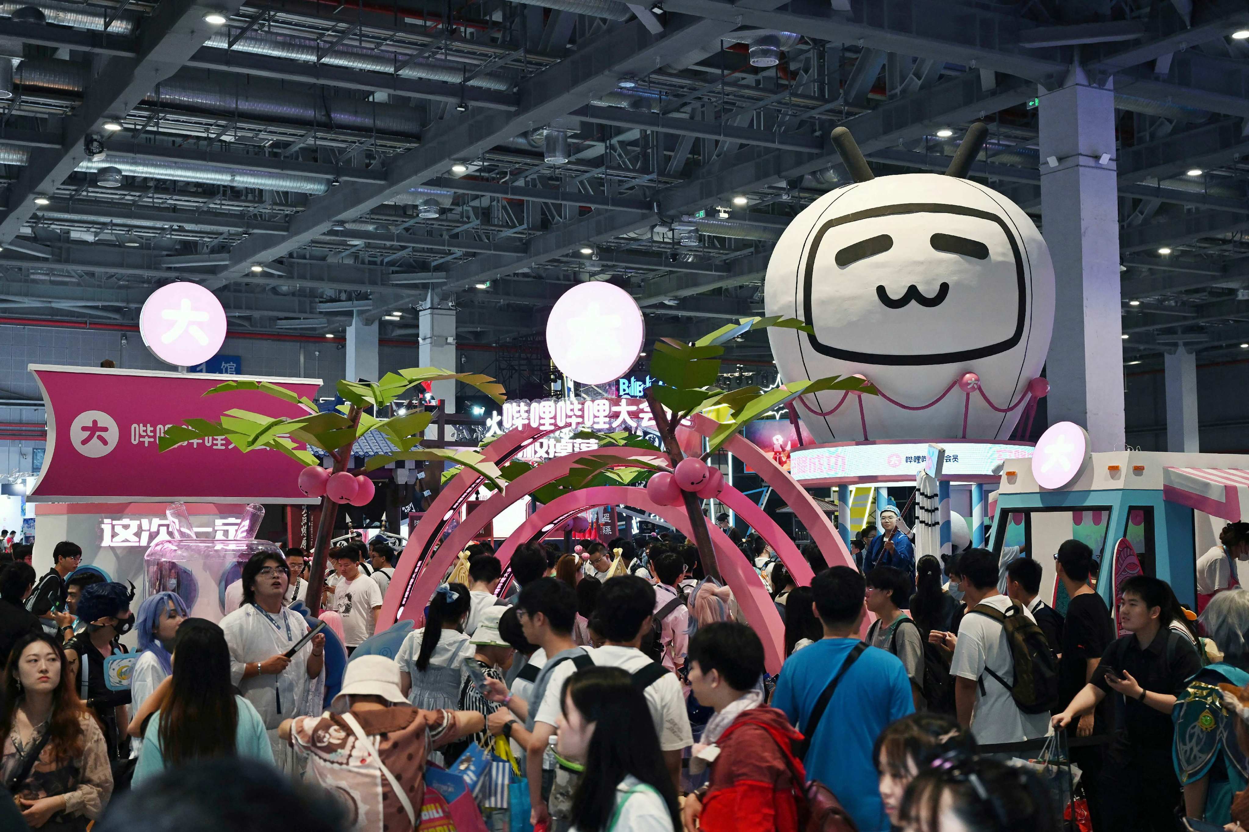 People visit Bilibili World 2023, an exhibition of animation, comics and games,  in Shanghai, July 21, 2023. Photo: AFP