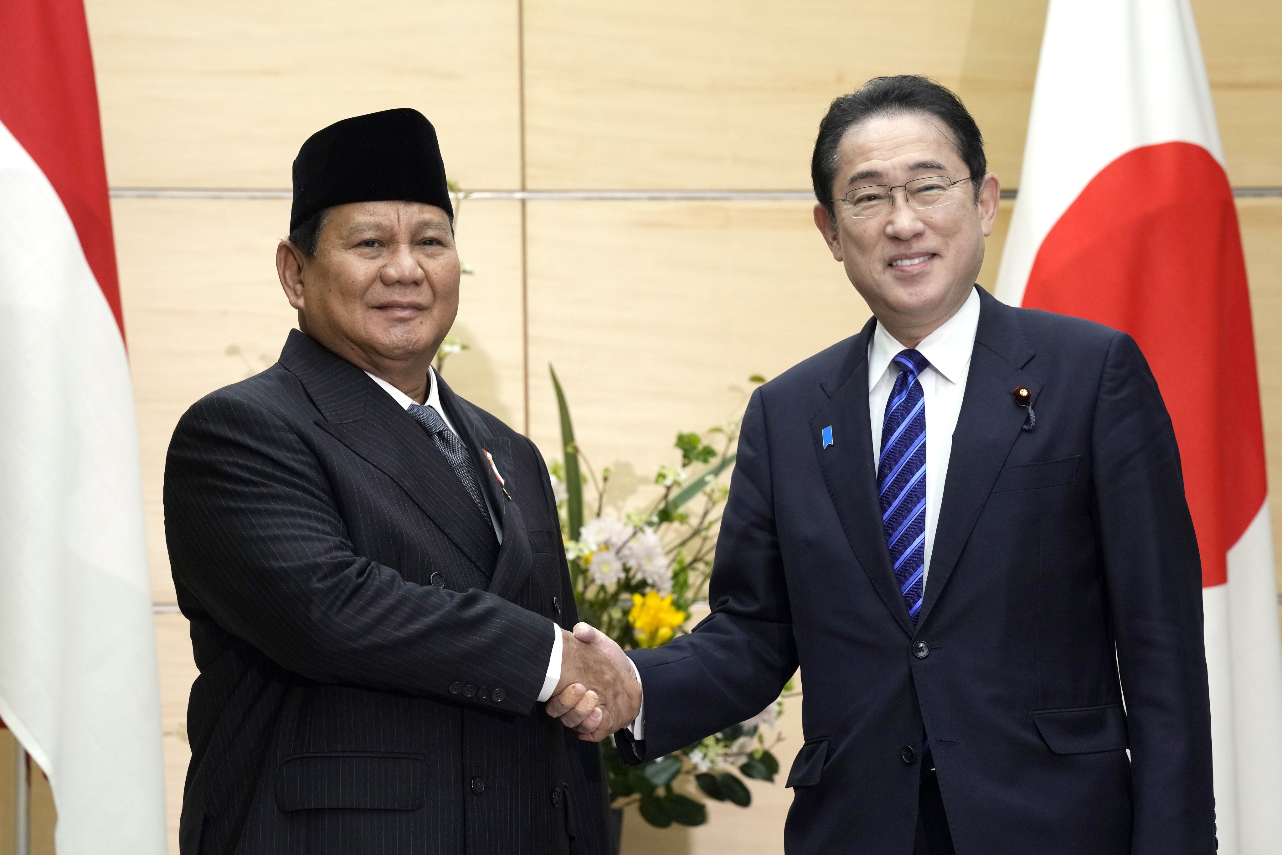 Indonesian president-elect and current defence minister Prabowo Subianto (left) and Japan’s Prime Minister Fumio Kishida shake hands at the prime minister’s office in Tokyo, Japan, on Wednesday. Photo: EPA-EFE