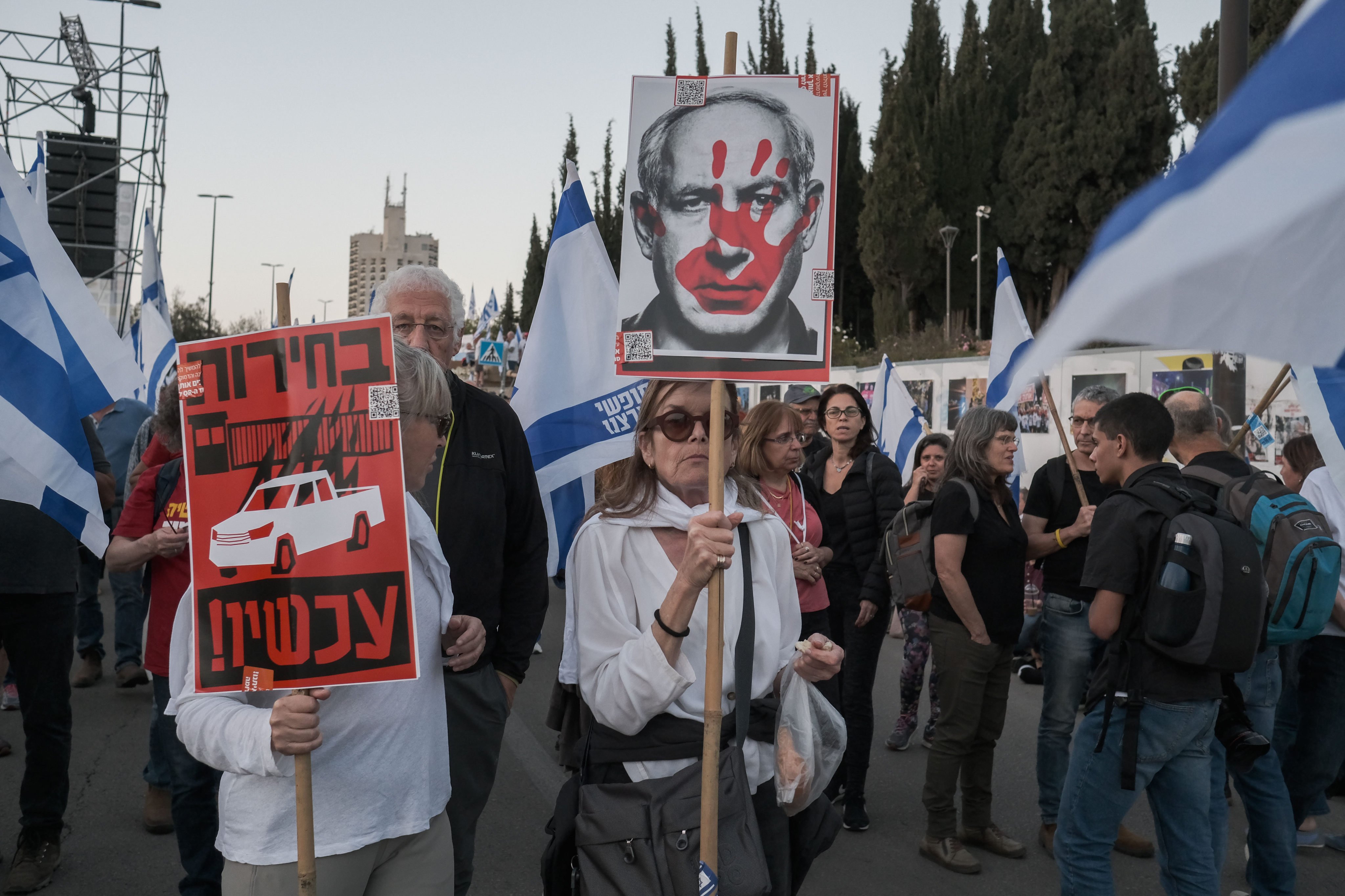 People take part in a protest against Israeli Prime Minister Benjamin Netanyahu in Jerusalem on Sunday. Photo: dpa