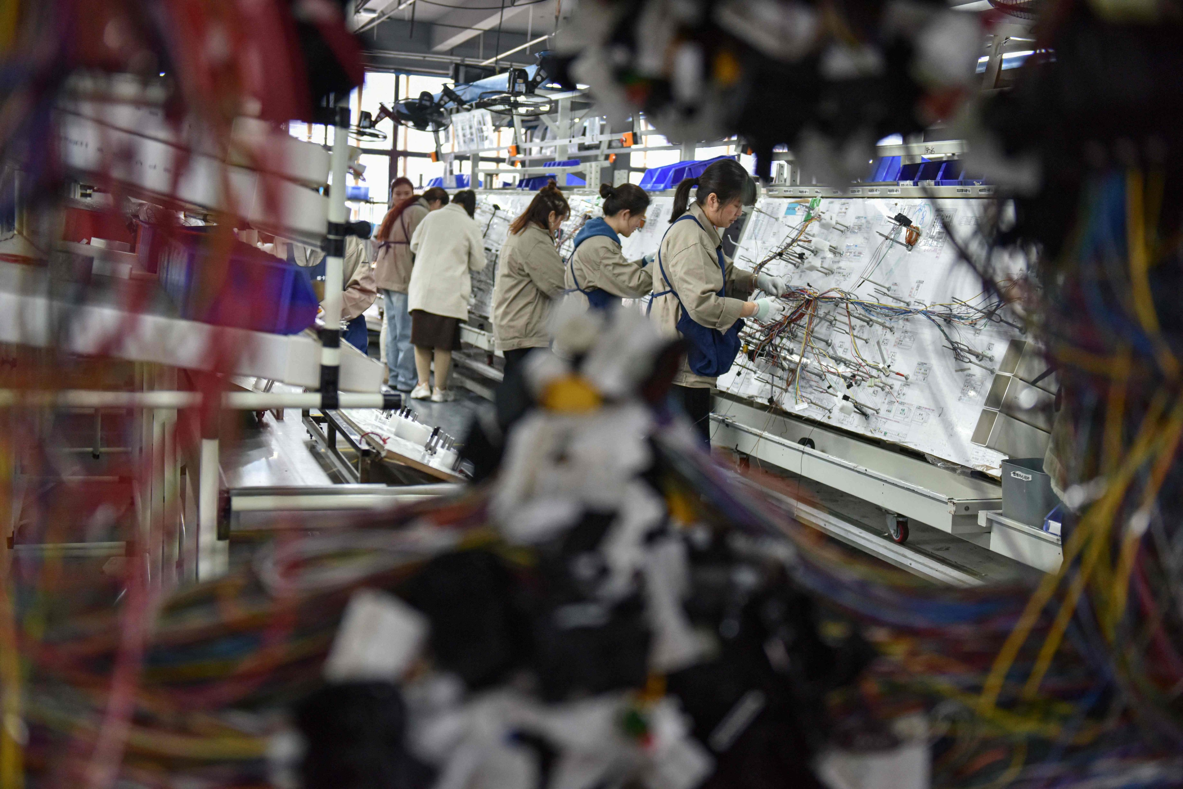 China’s official manufacturing purchasing managers’ index (PMI) returned to expansion in March, while the Caixin/S&P Global gauge for factory activity also rose last month. Photo: AFP