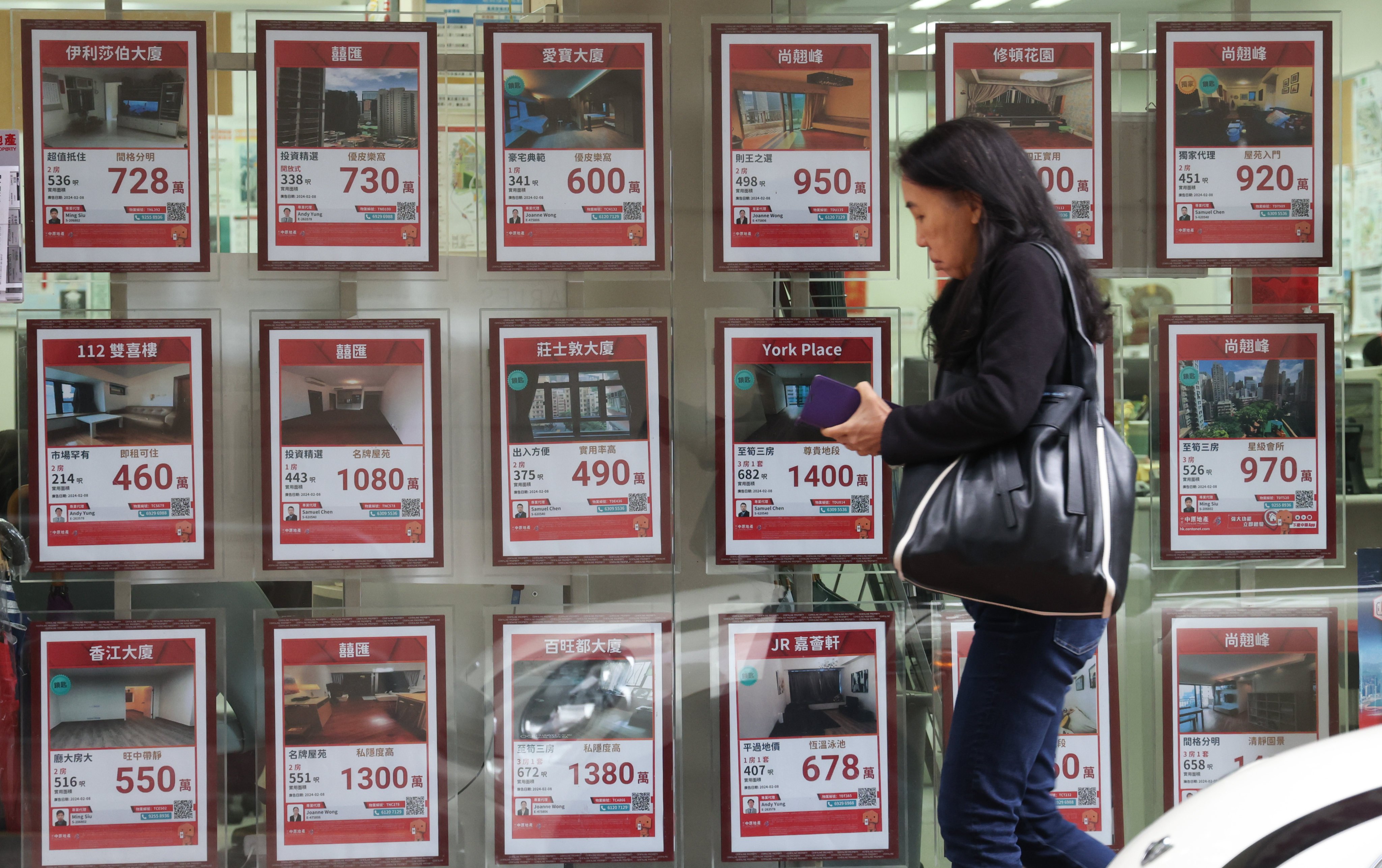 A property agency in Hong Kong’s Wan Chai district. On Tuesday, Midland and Centaline, two of Hong Kong’s largest real estate agencies, forecast that the total number of transactions could have breached the 5,000 deals mark in March. Photo: Jelly Tse