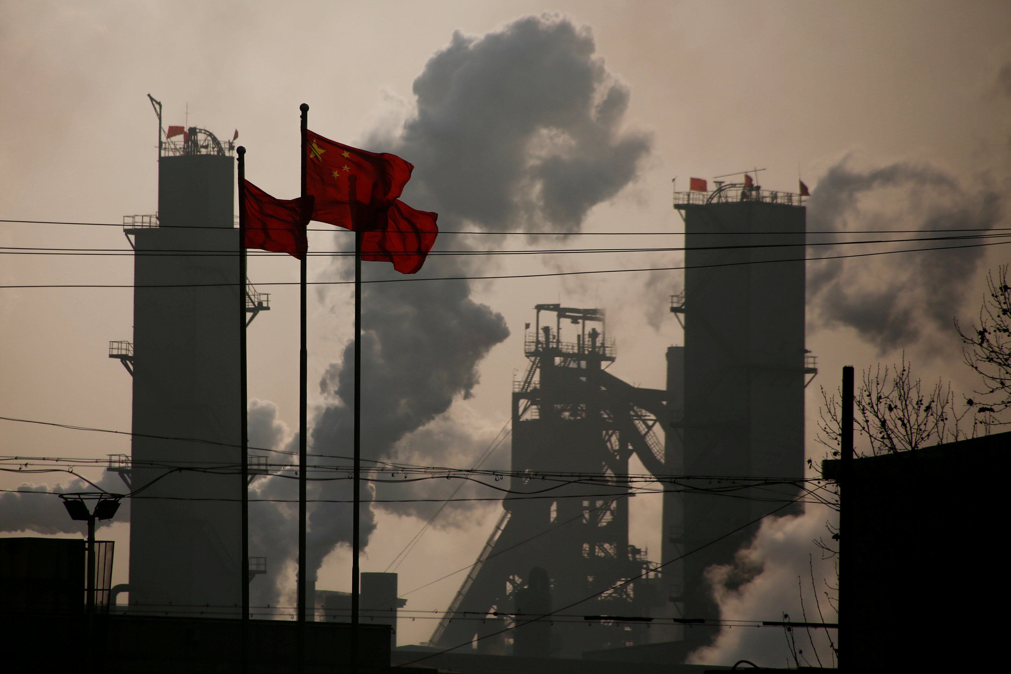 A steel factory in Wuhan, in China’s Hebei province. Heavy industries such as iron and steel need to upgrade and replace their equipment with more energy-efficient and lower-emitting alternatives, according to the State Council. Photo: Reuters