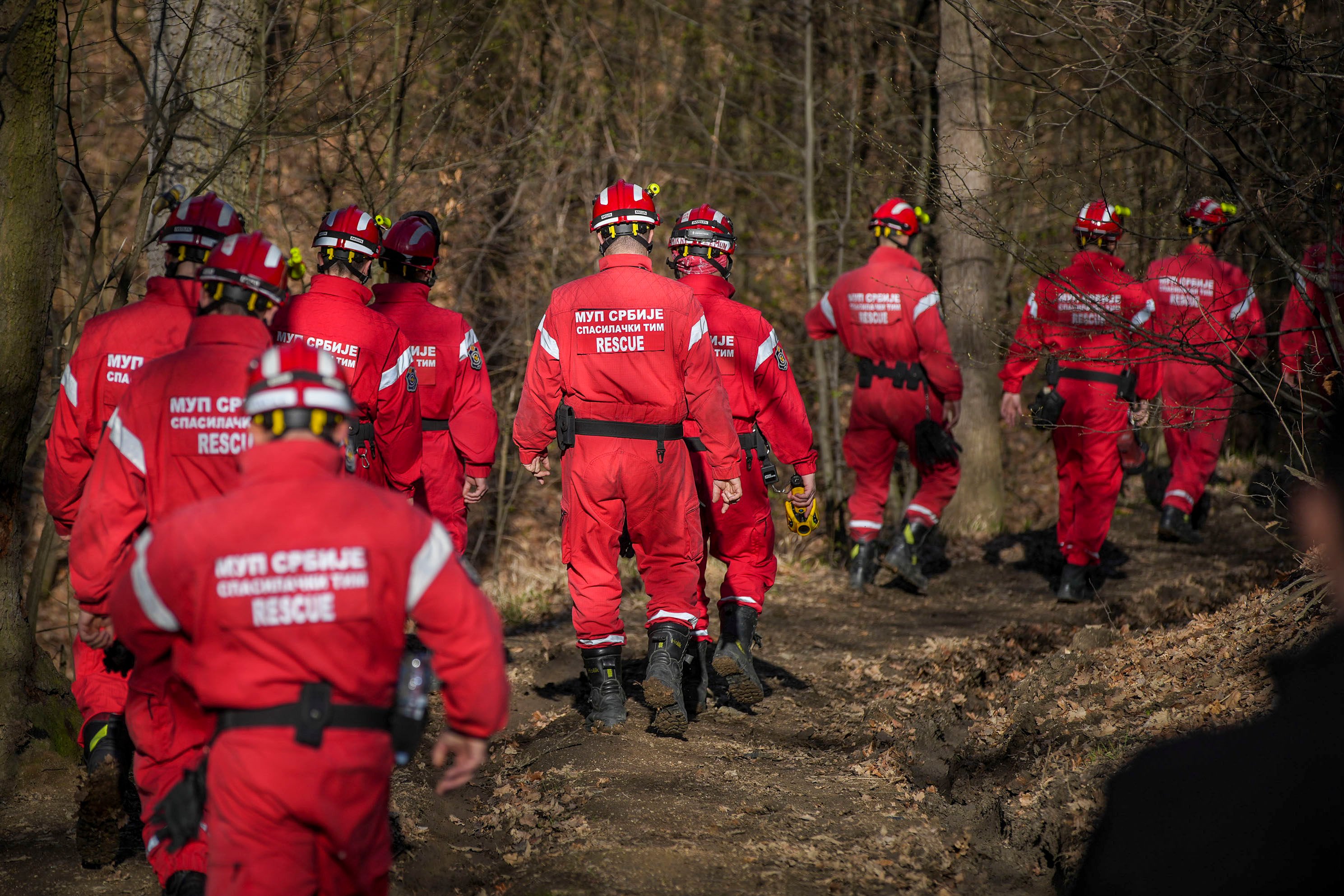 The Serbian police rescue team search a forest near Bor. Serbian police have arrested two men suspected of killing a 2-year-old girl whose disappearance last month gripped the nation. Photo: AP