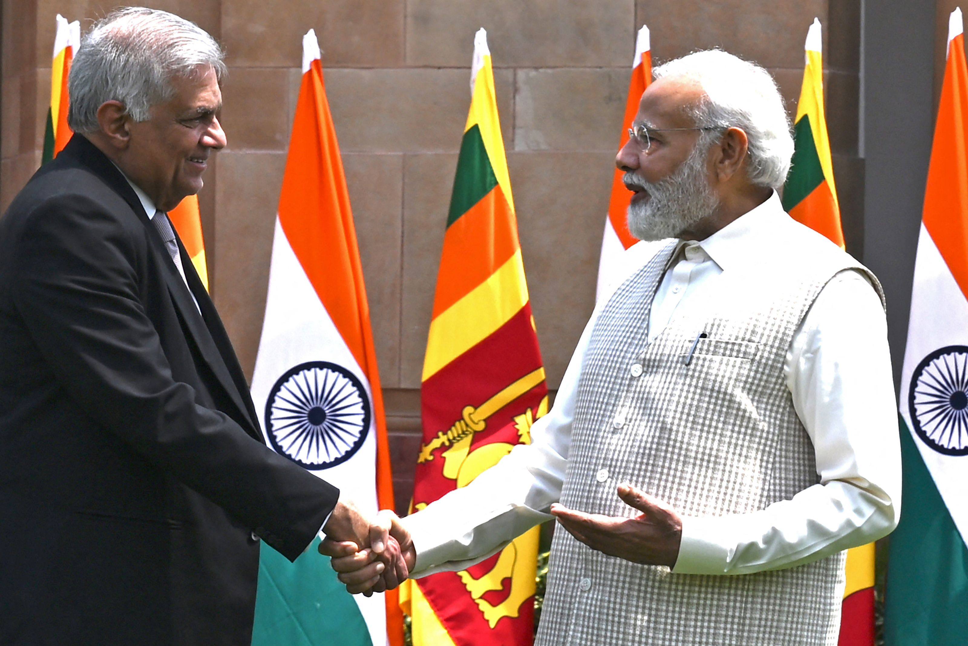 Sri Lanka’s President Ranil Wickremesinghe (left) shakes hands with India’s Prime Minister Narendra Modi before a meeting in New Delhi on July 21, 2023. Photo: AFP