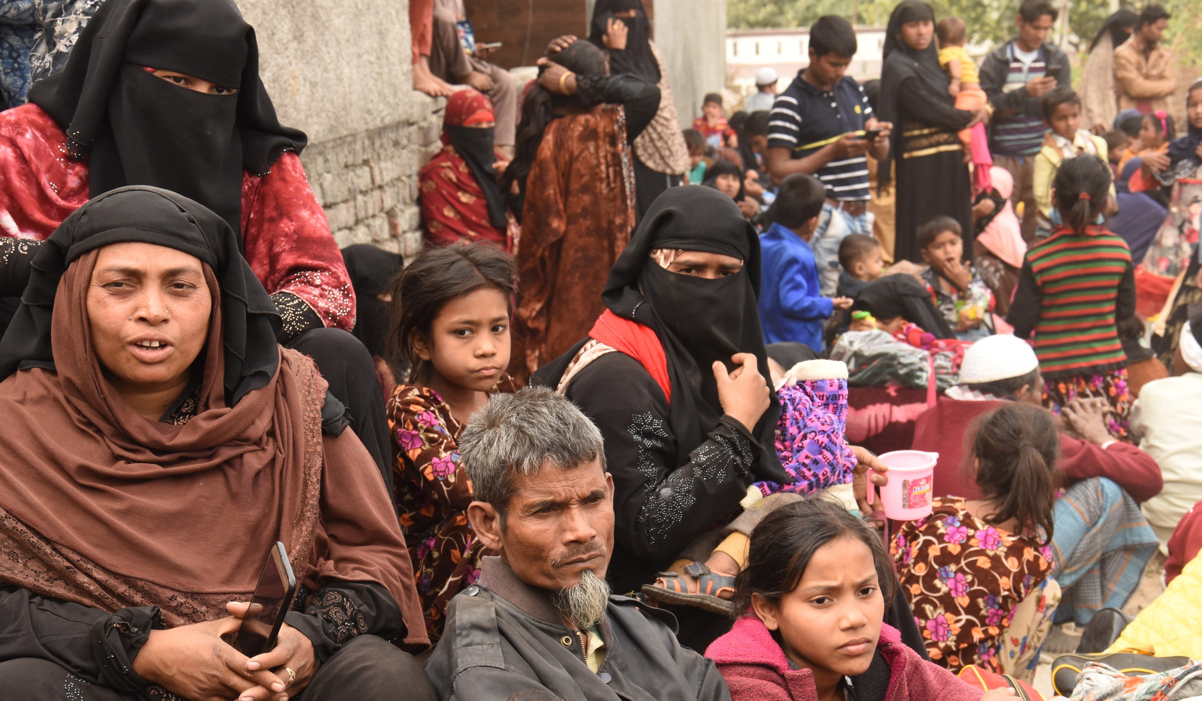 Rohingya Muslims from Myanmar gather outside a mosque in Jammu, the capital of Kashmir, India, on March 7, 2021. Photo: EPA-EFE