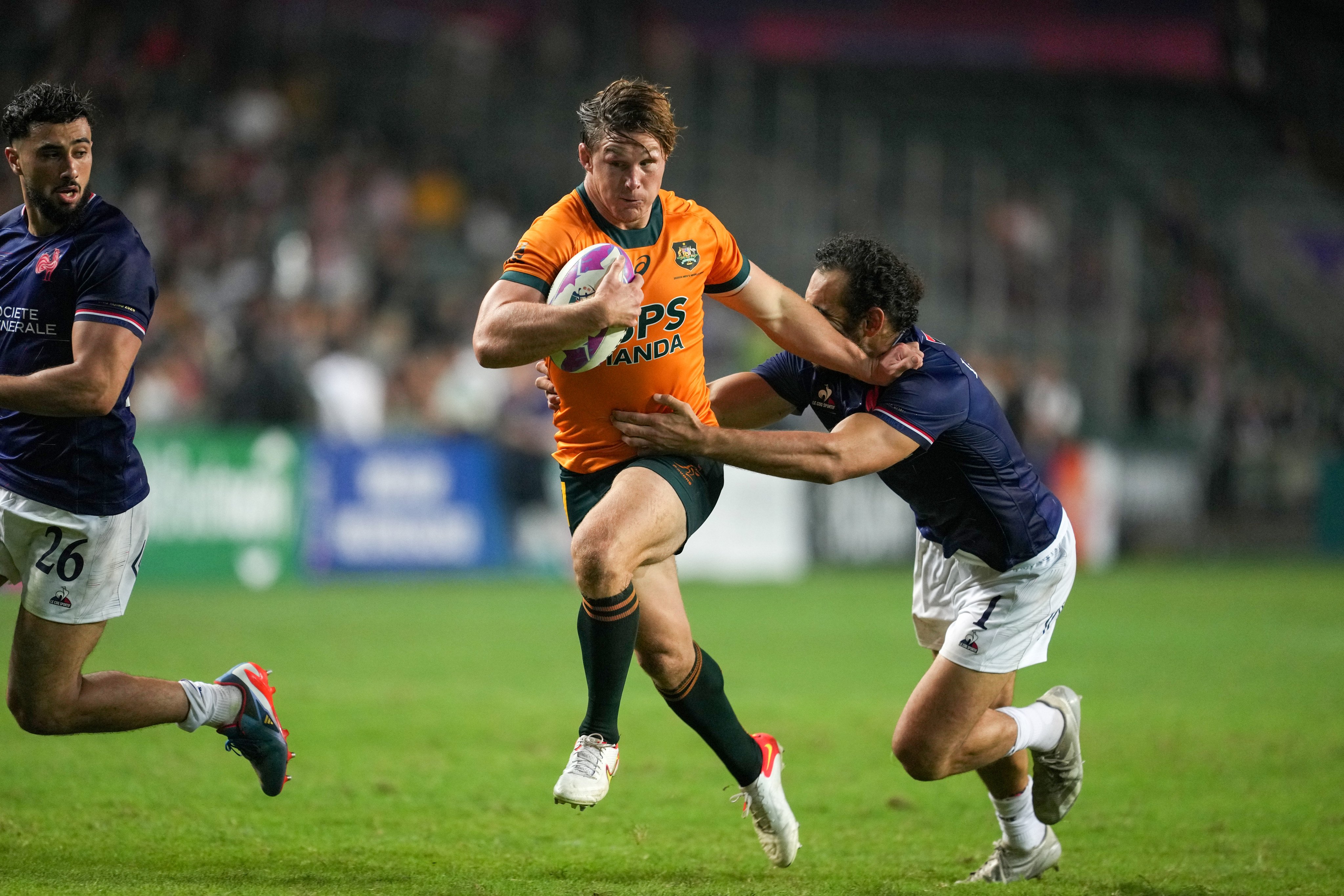Michael Hooper on the charge against France on his opening day as a sevens player. Photo: Elson Li