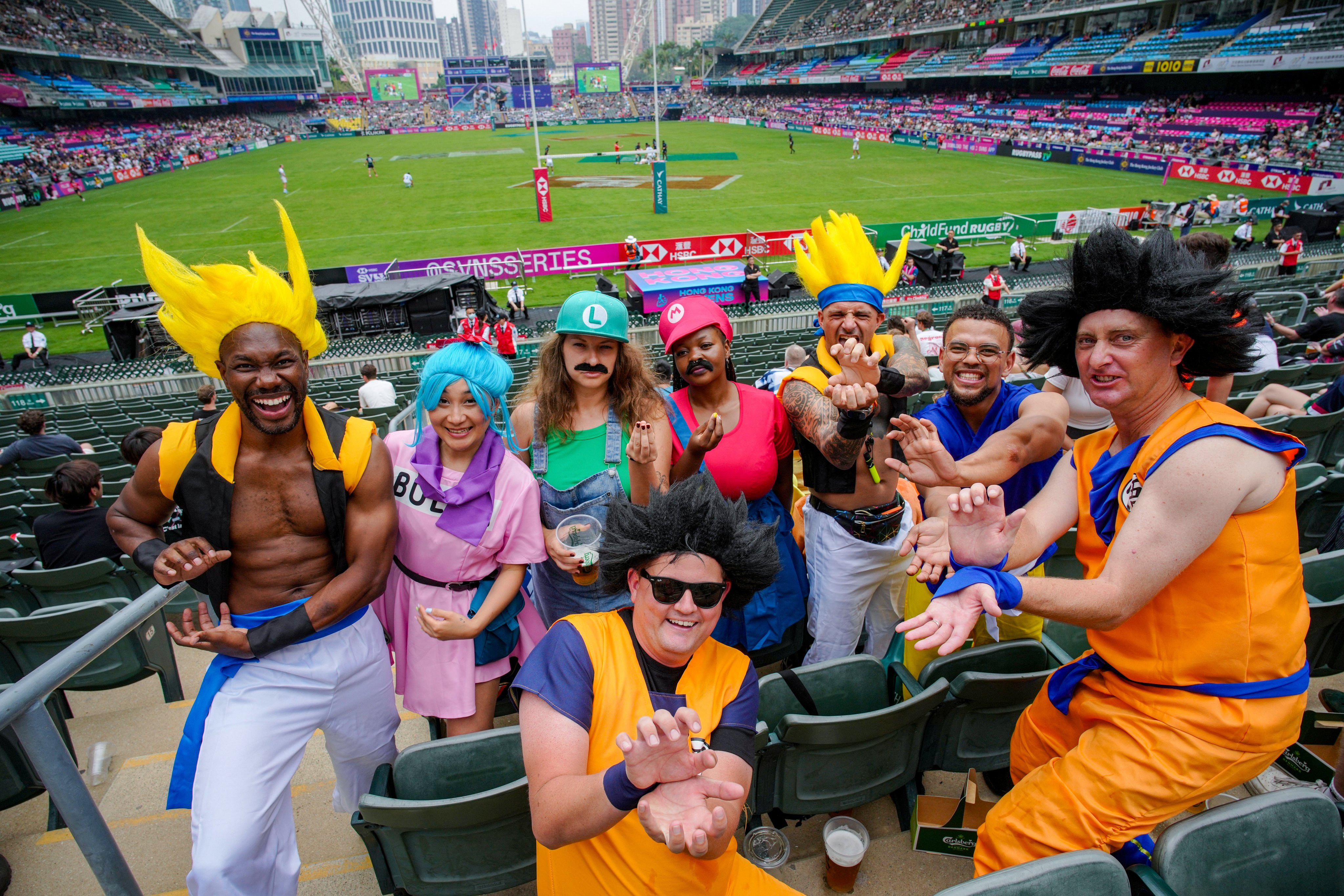 Fans dressing as cartoon characters on the first day of Hong Kong Sevens. Photo: Eugene Lee