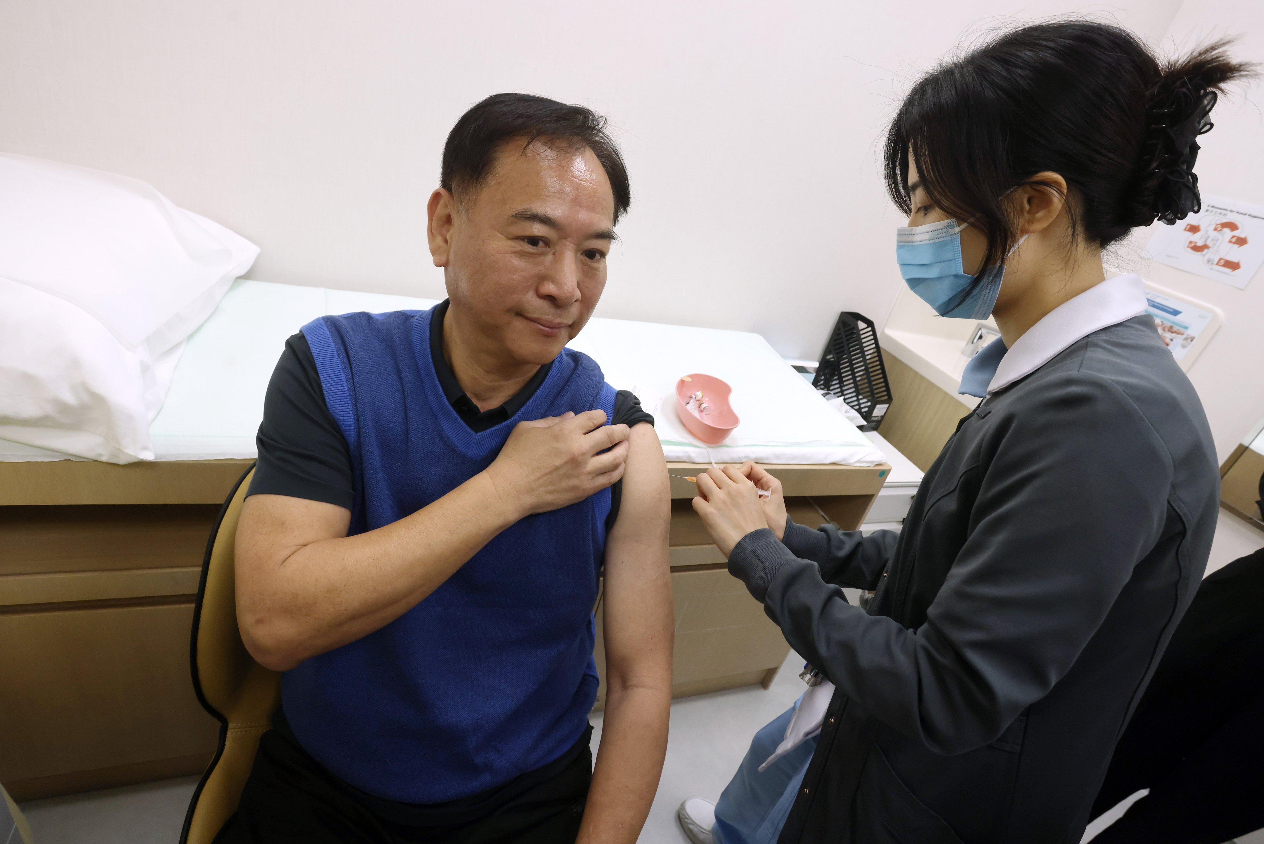 A man receives his vaccine against the respiratory syncytial virus (RSV), a common infection that can effect the elderly more seriously, in Hong Kong on December 4. Photo: Jonathan Wong