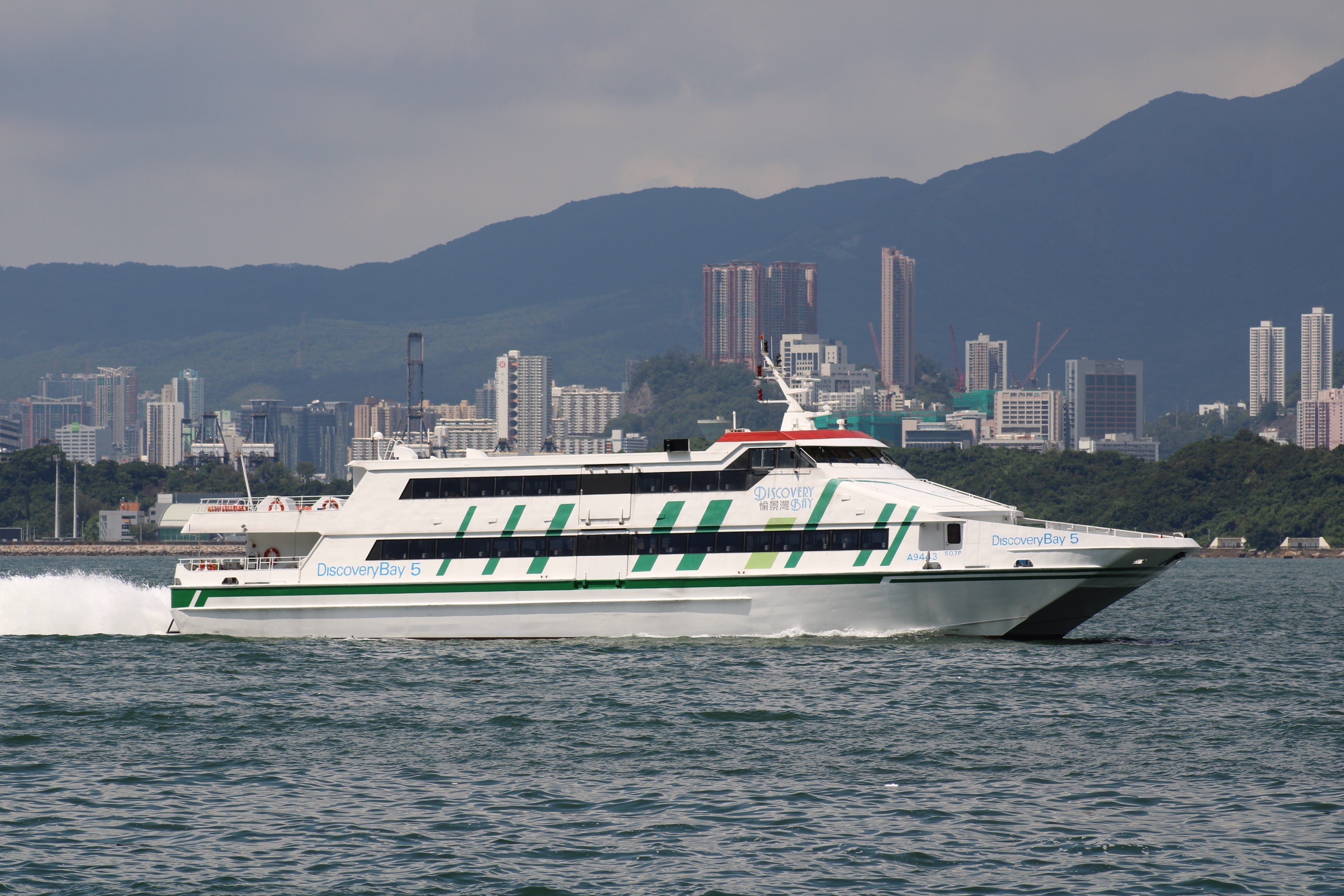 A ferry serving the Discovery Bay route sails through Victoria Harbour in June 2023. Photo: Shutterstock